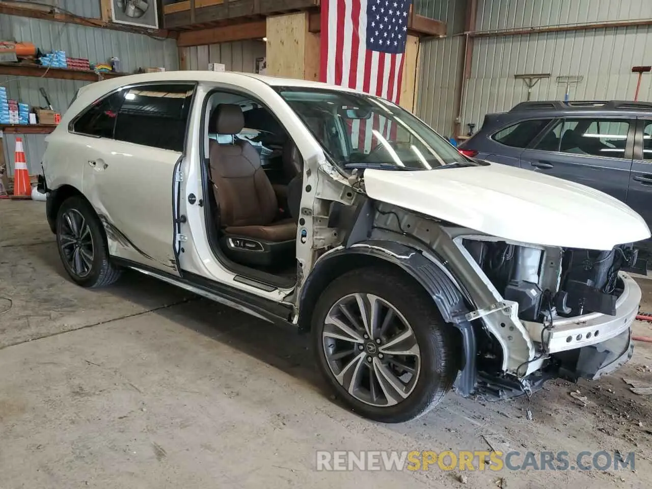 4 Photograph of a damaged car 5J8YD4H50KL016670 ACURA MDX 2019