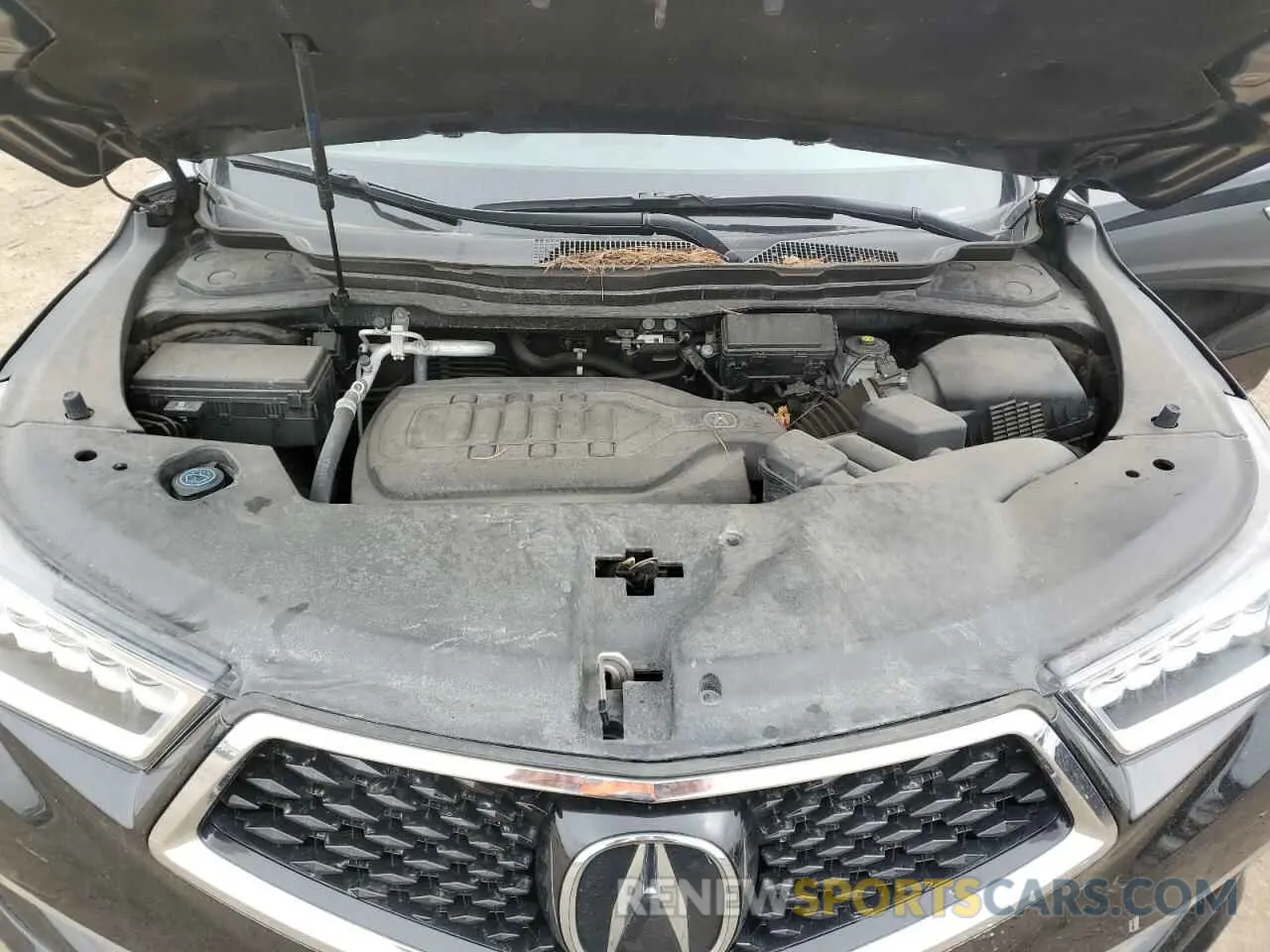 11 Photograph of a damaged car 5J8YD4H31LL002907 ACURA MDX 2020