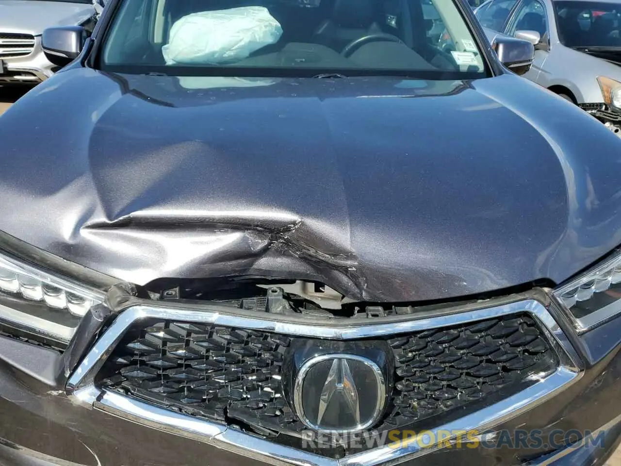 12 Photograph of a damaged car 5J8YD4H34LL041619 ACURA MDX 2020