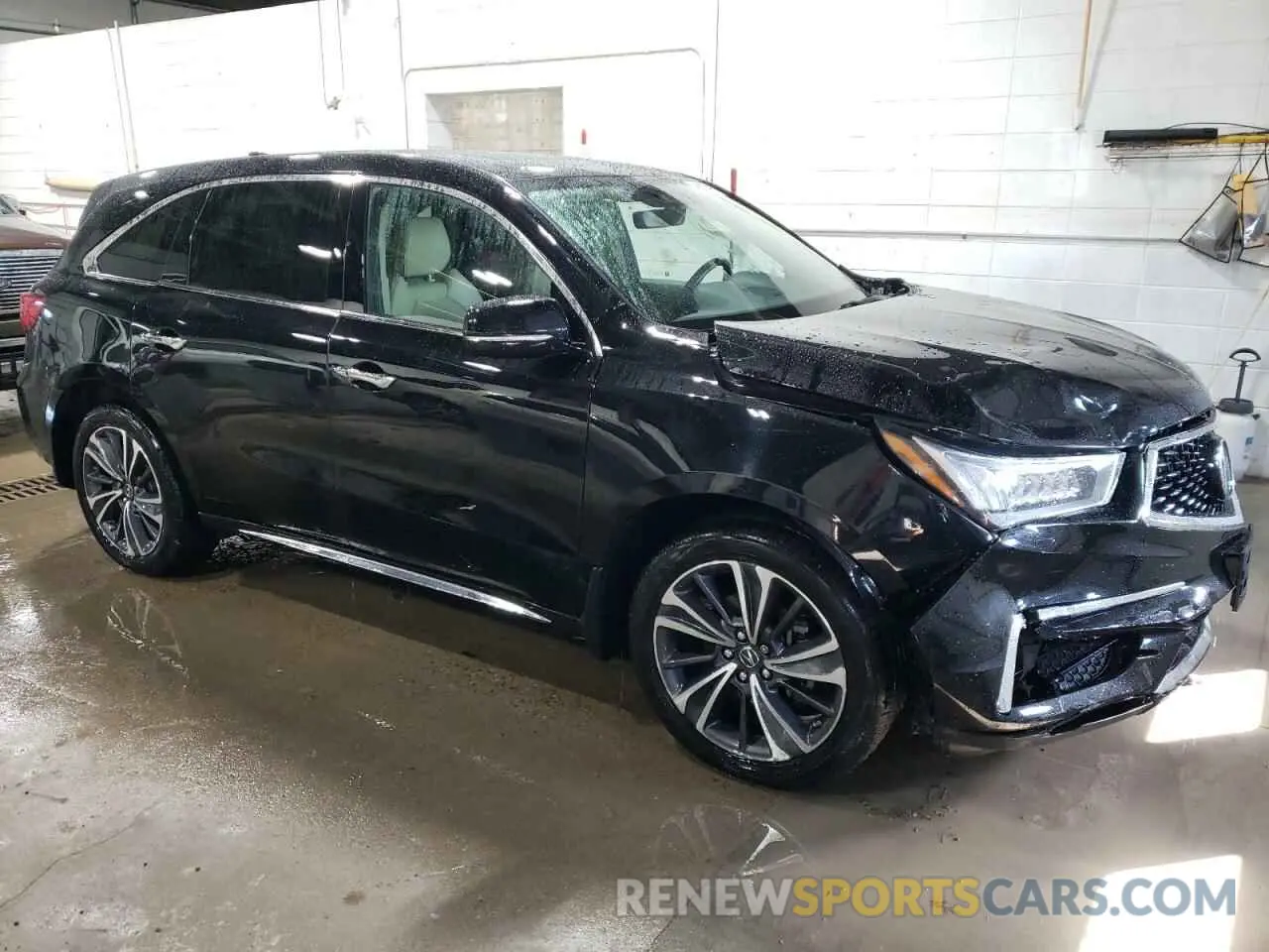 4 Photograph of a damaged car 5J8YD4H58LL009600 ACURA MDX 2020