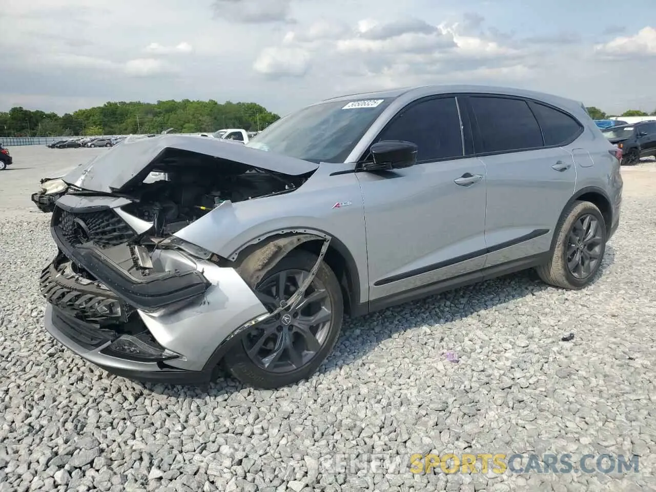 1 Photograph of a damaged car 5J8YE1H01NL020991 ACURA MDX 2022