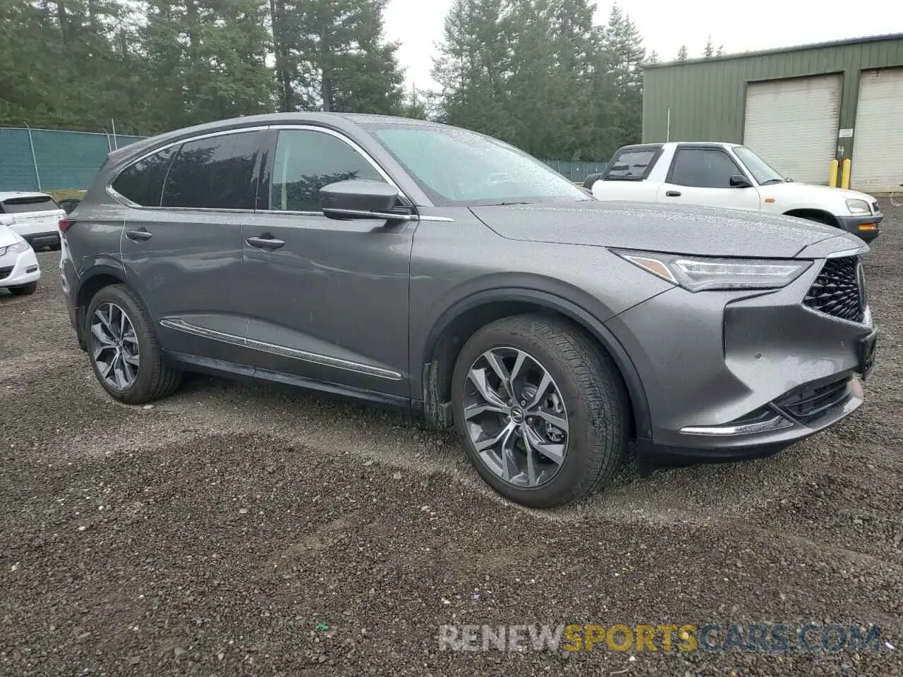 4 Photograph of a damaged car 5J8YE1H40NL009435 ACURA MDX 2022