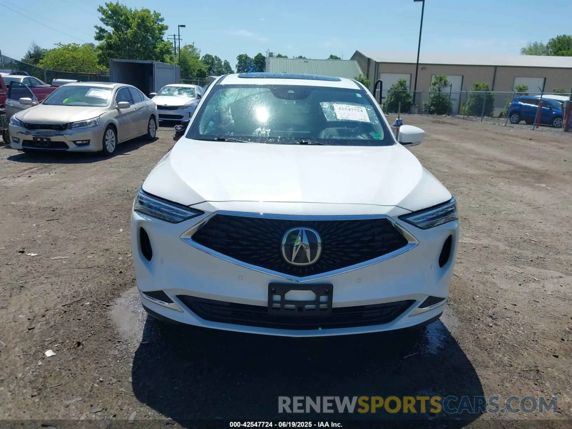12 Photograph of a damaged car 5J8YE1H44NL035939 ACURA MDX 2022