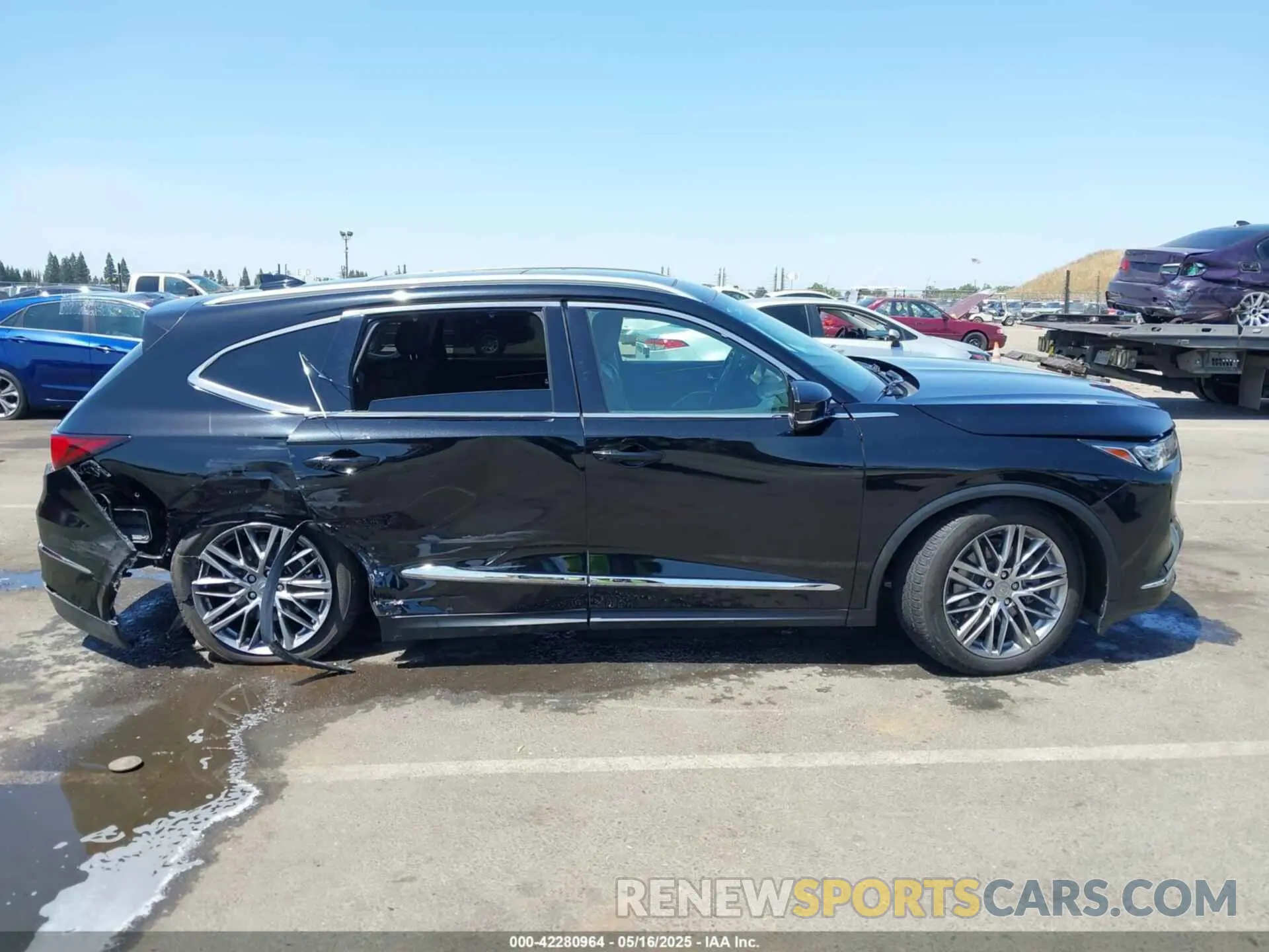 14 Photograph of a damaged car 5J8YE1H85NL008834 ACURA MDX 2022