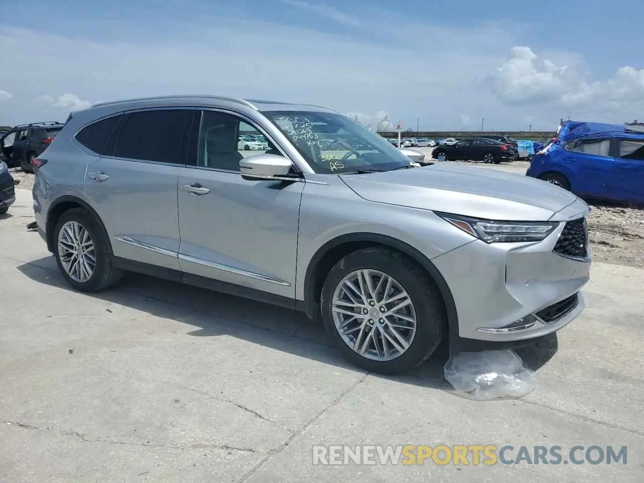 4 Photograph of a damaged car 5J8YE1H89NL044753 ACURA MDX 2022
