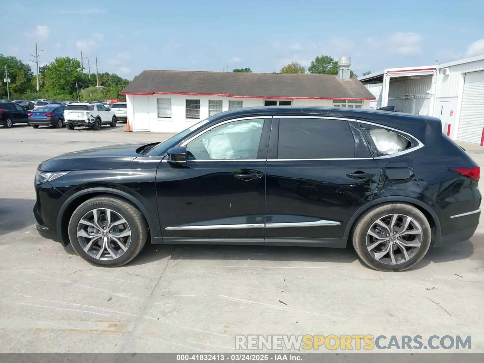 14 Photograph of a damaged car 5J8YD9H42PL003124 ACURA MDX 2023