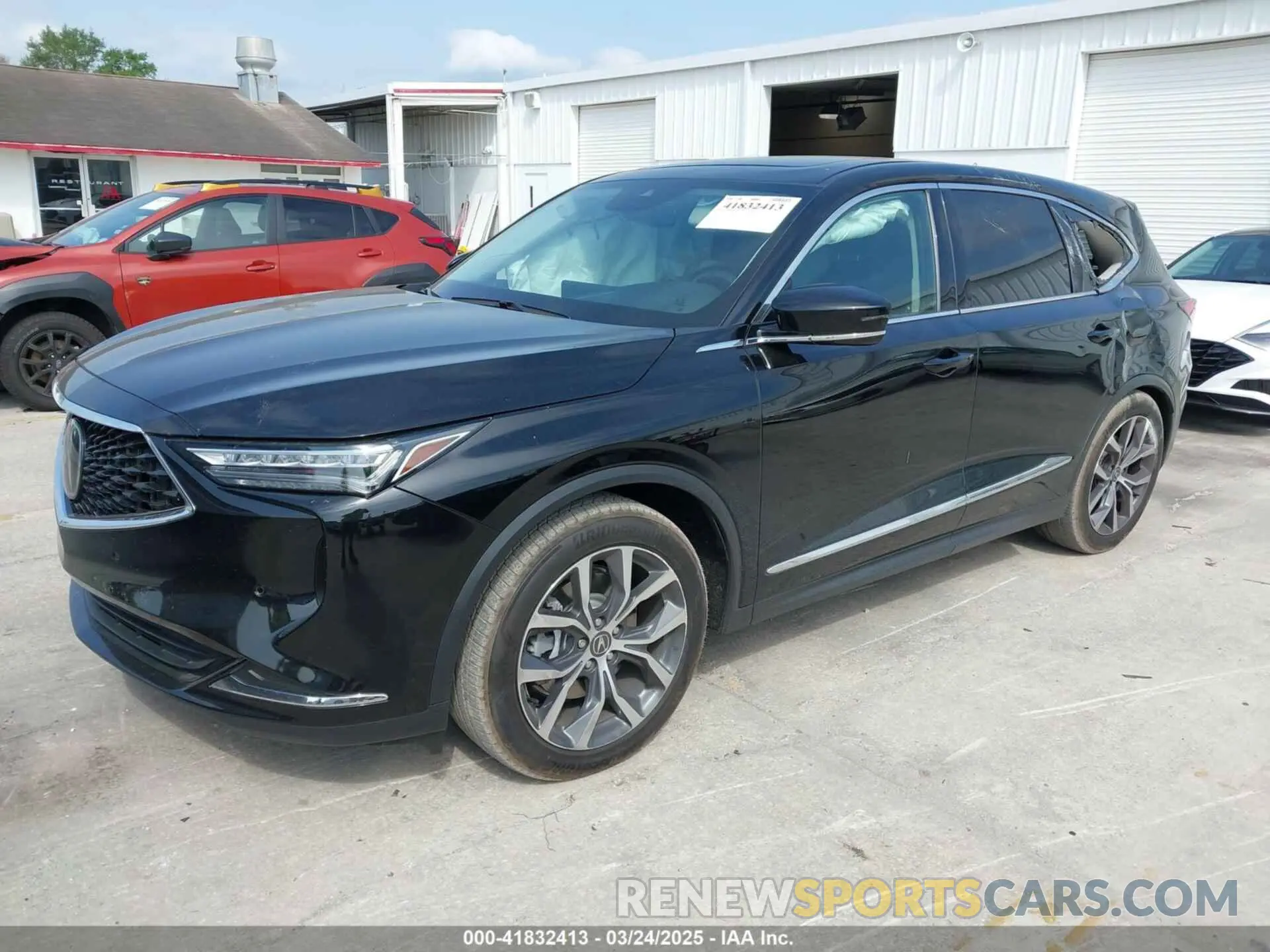2 Photograph of a damaged car 5J8YD9H42PL003124 ACURA MDX 2023