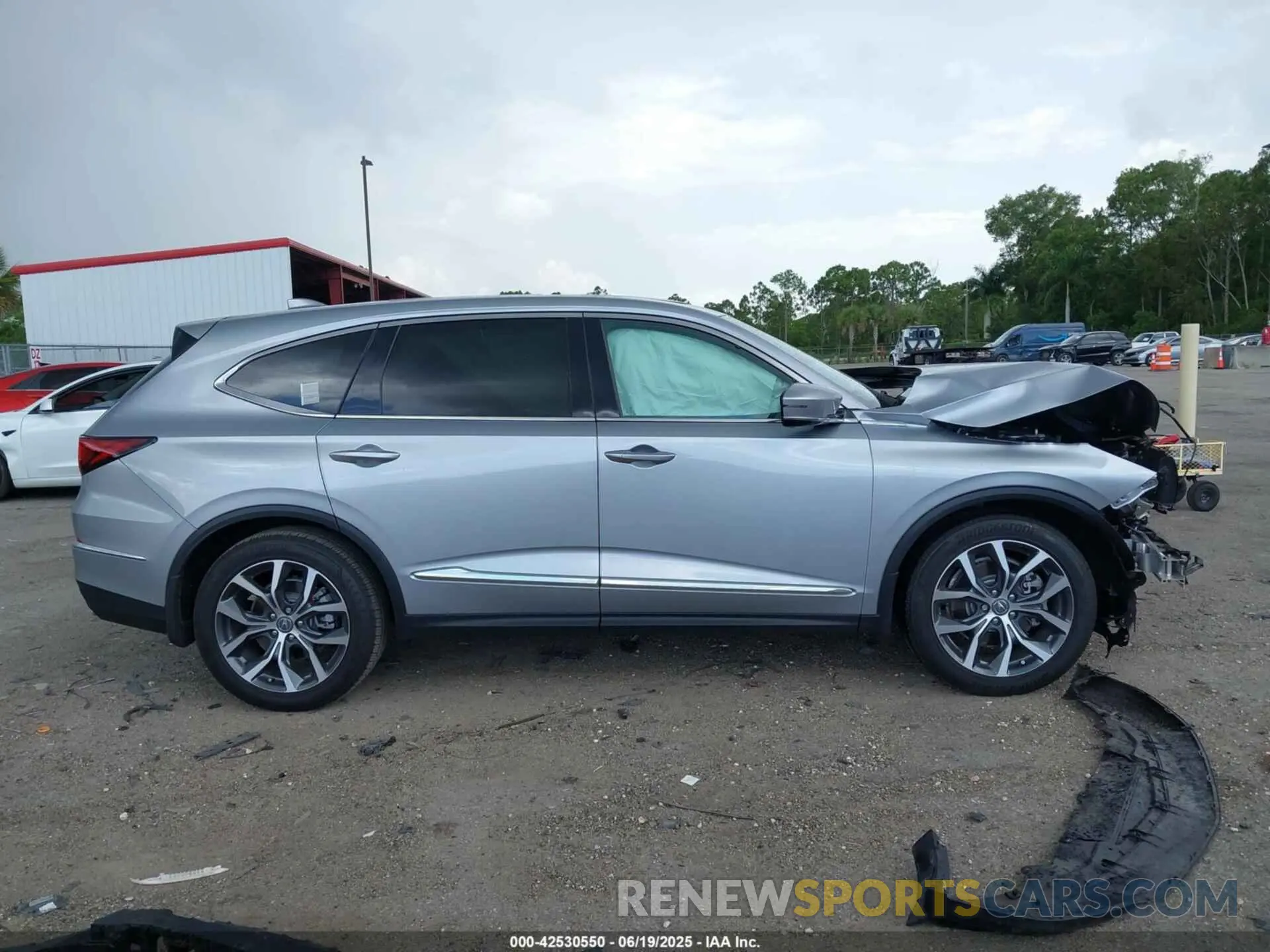 14 Photograph of a damaged car 5J8YD9H46PL000887 ACURA MDX 2023