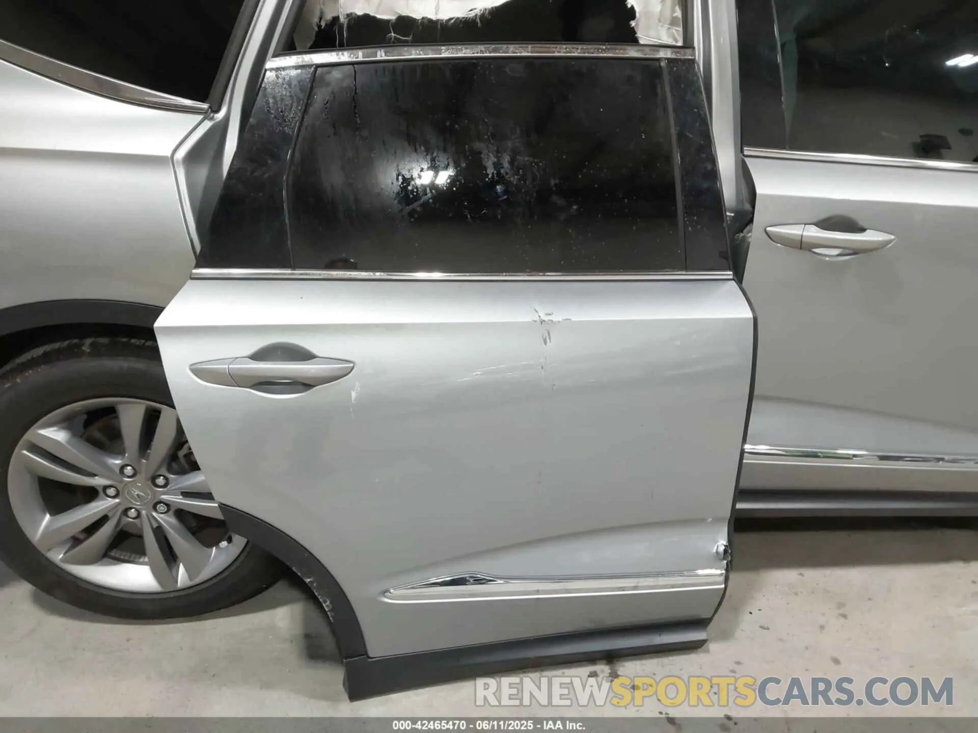 12 Photograph of a damaged car 5J8YE1H33RL035282 ACURA MDX 2024