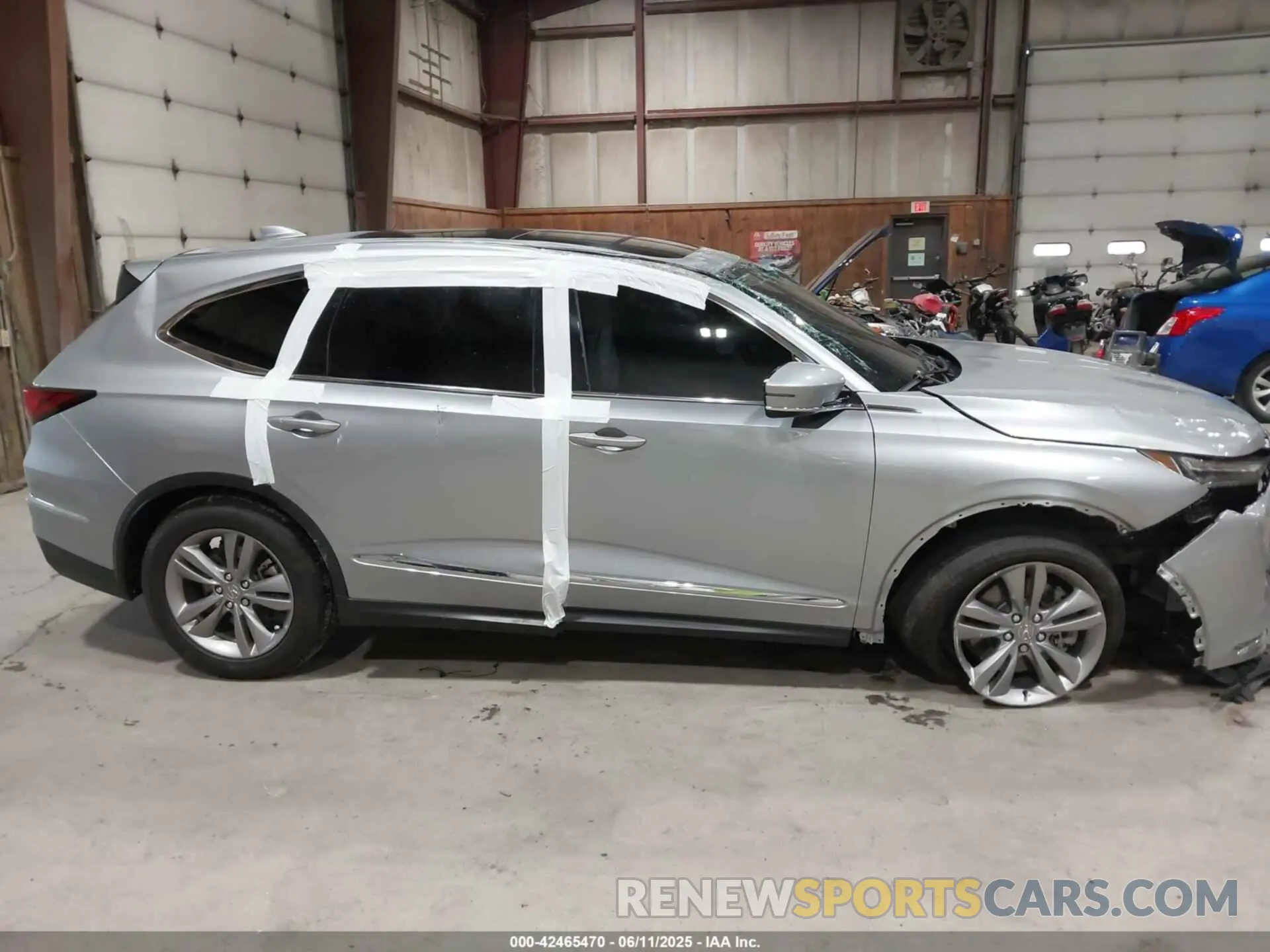 14 Photograph of a damaged car 5J8YE1H33RL035282 ACURA MDX 2024