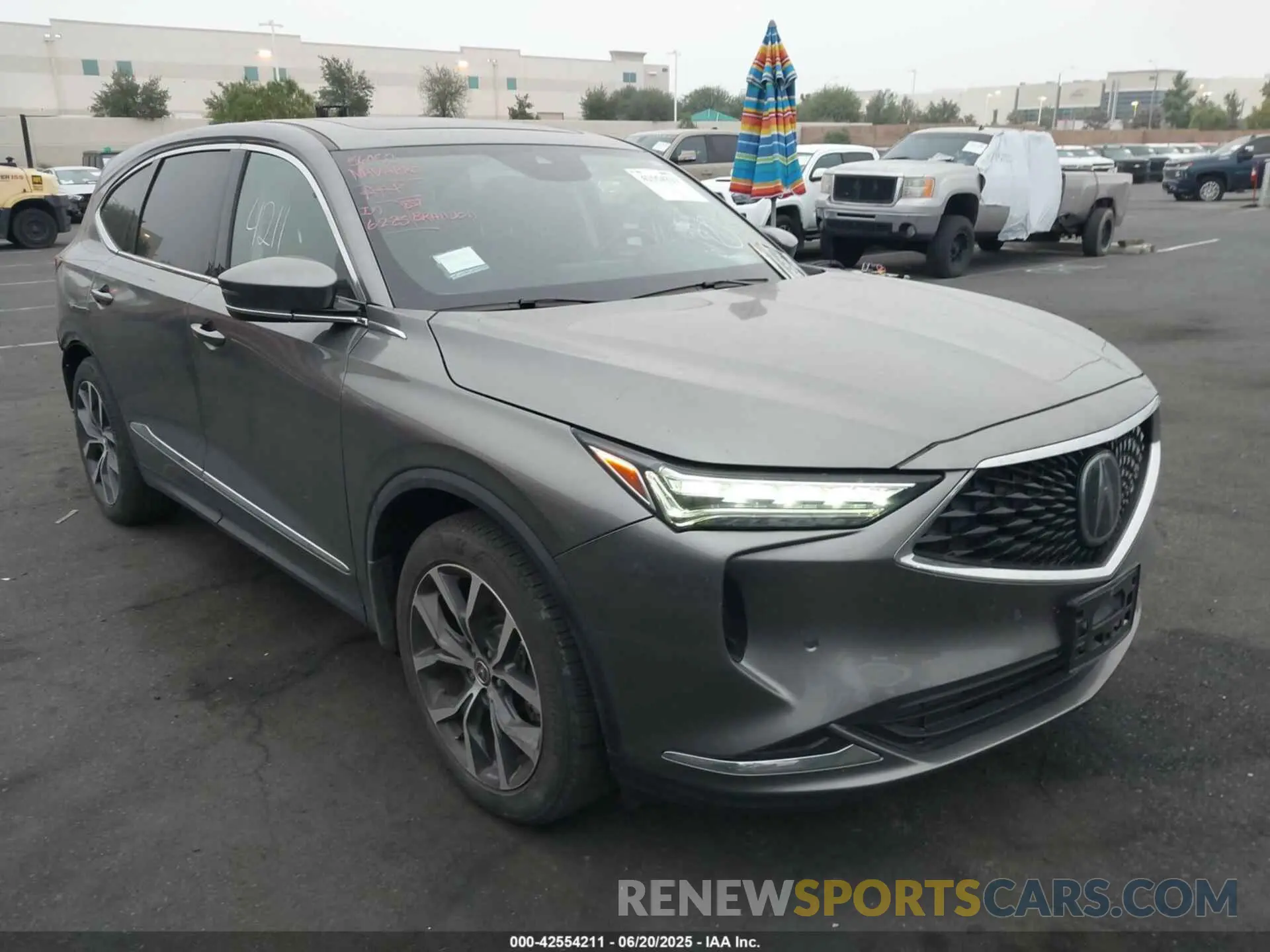 1 Photograph of a damaged car 5J8YE1H42RL007580 ACURA MDX 2024