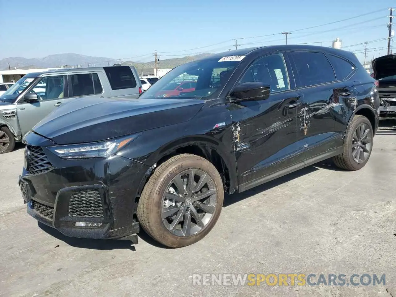 1 Photograph of a damaged car 5J8YE1H06SL010596 ACURA MDX 2025