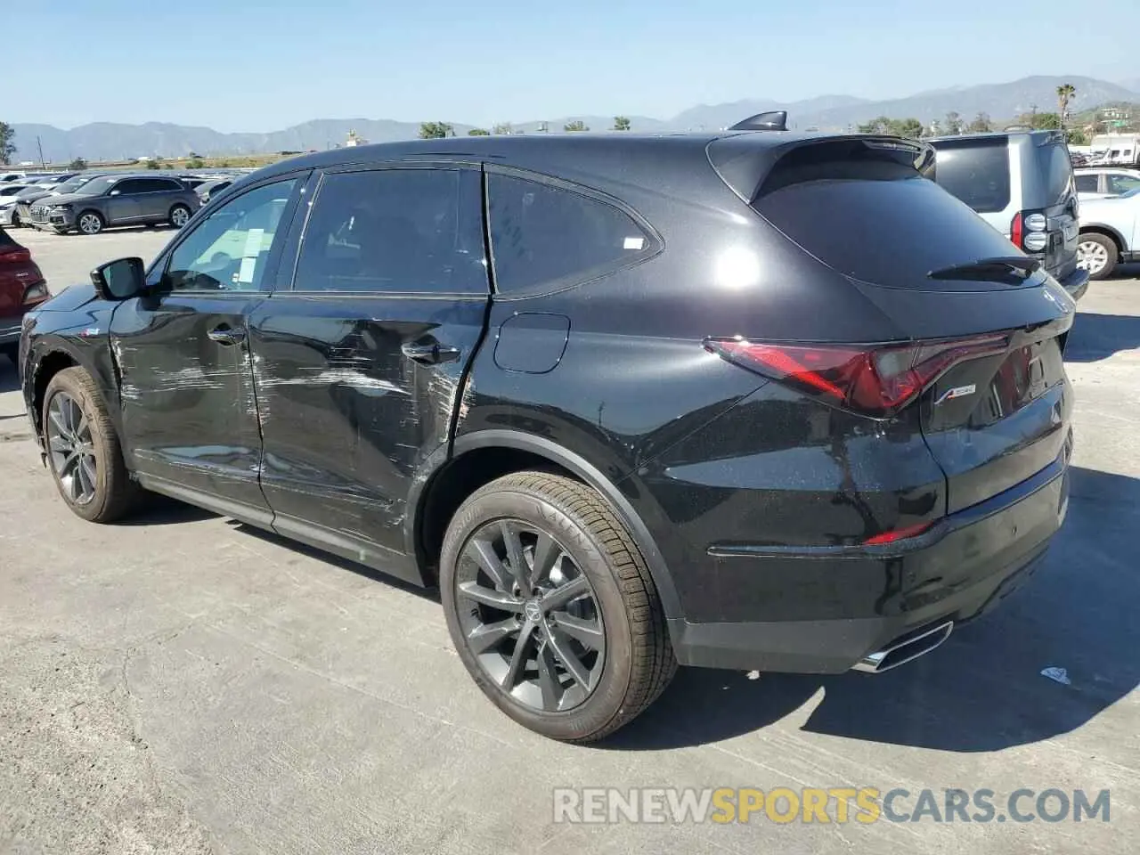 2 Photograph of a damaged car 5J8YE1H06SL010596 ACURA MDX 2025