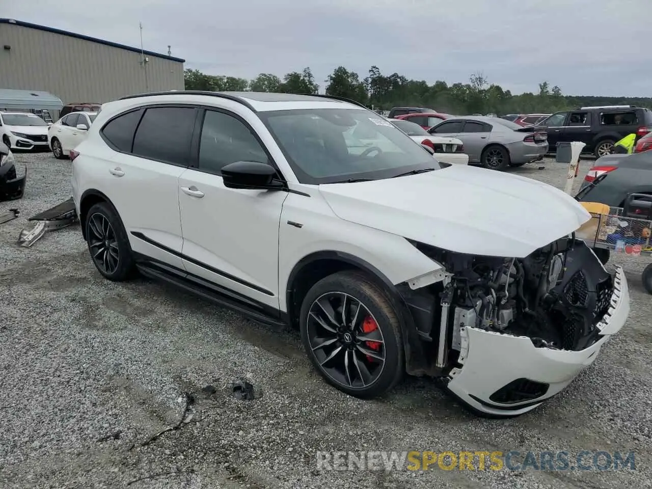 4 Photograph of a damaged car 5J8YD8H83NL005426 ACURA MDX TYPE S 2022