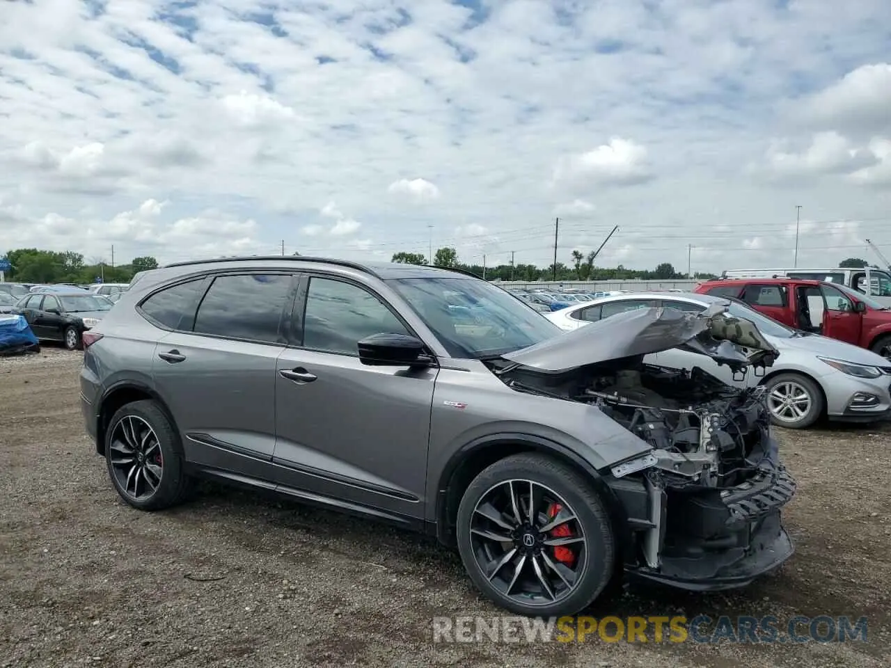 4 Photograph of a damaged car 5J8YD8H85PL001803 ACURA MDX TYPE S 2023
