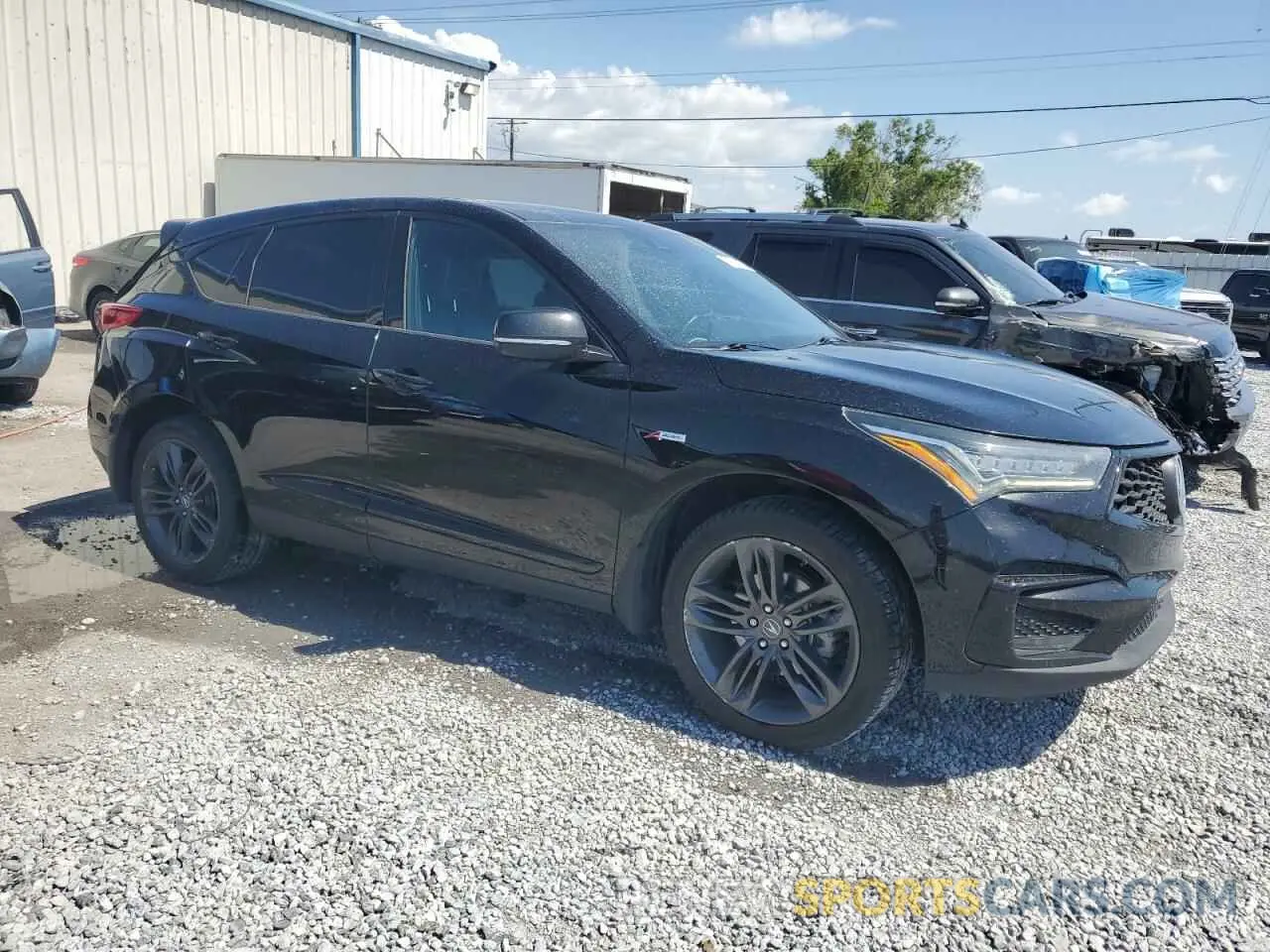 4 Photograph of a damaged car 5J8TC1H68LL016552 ACURA RDX 2020