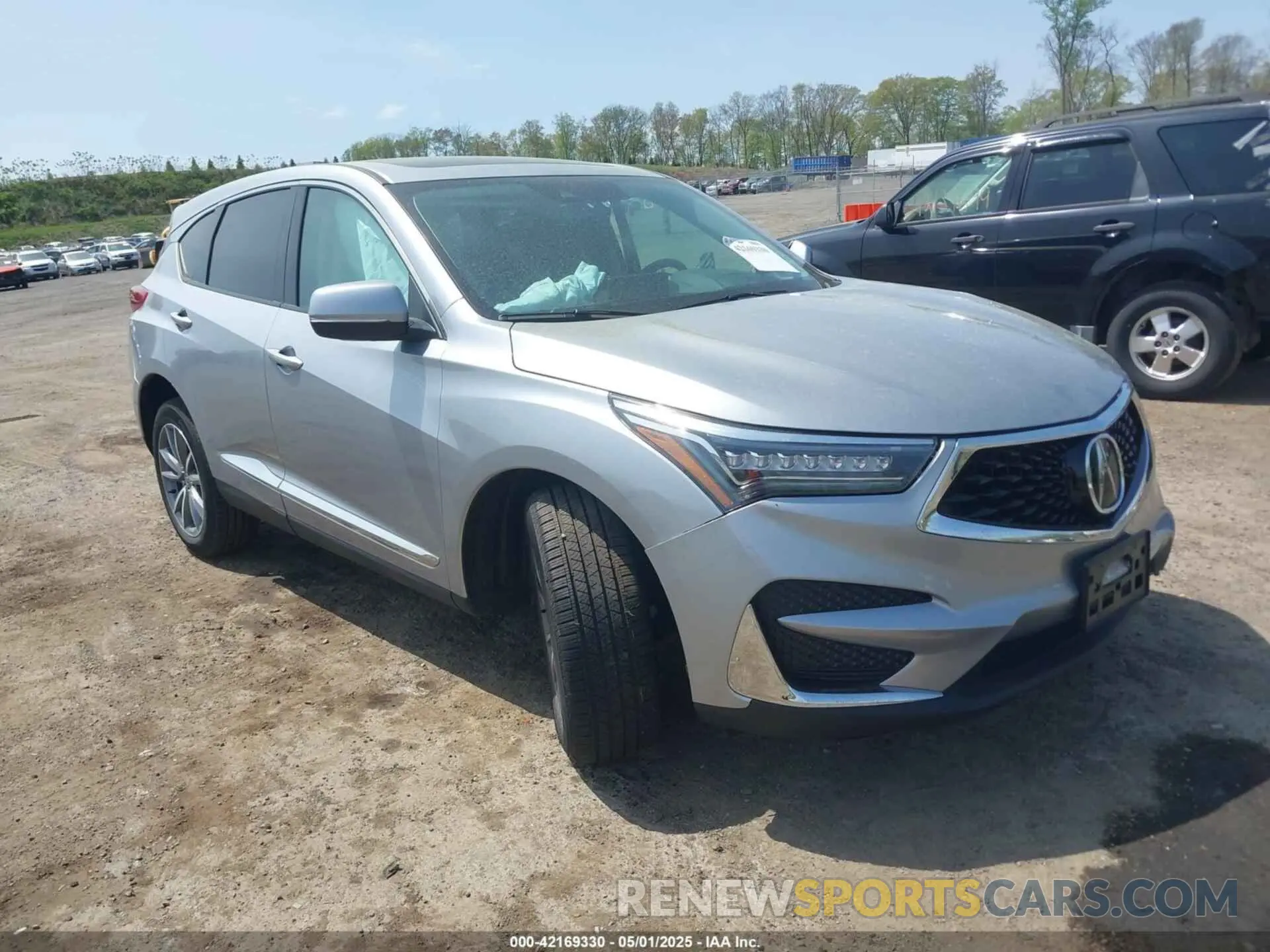 1 Photograph of a damaged car 5J8TC2H57ML010790 ACURA RDX 2021