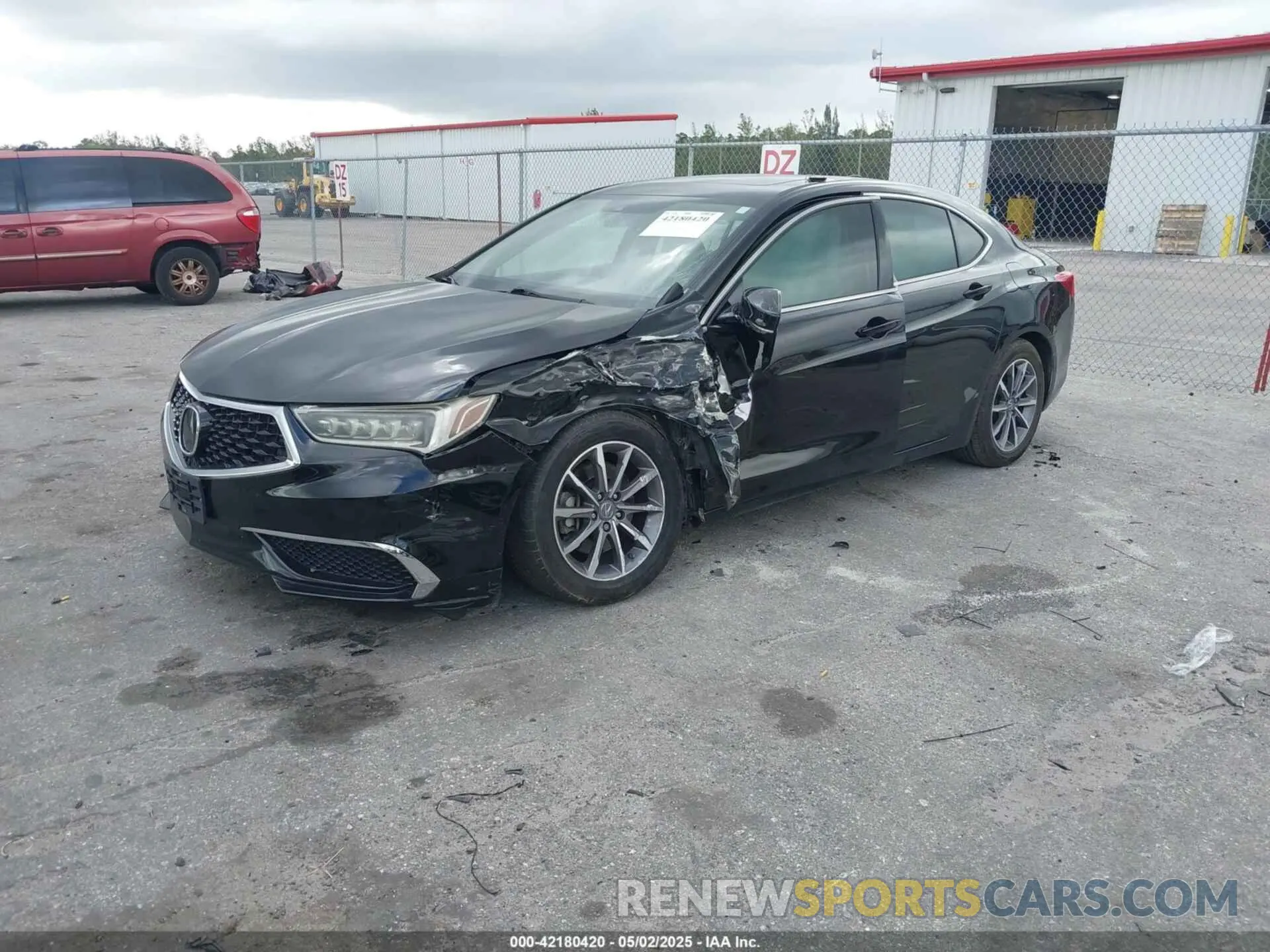 2 Photograph of a damaged car 19UUB1F33KA010488 ACURA TLX 2019