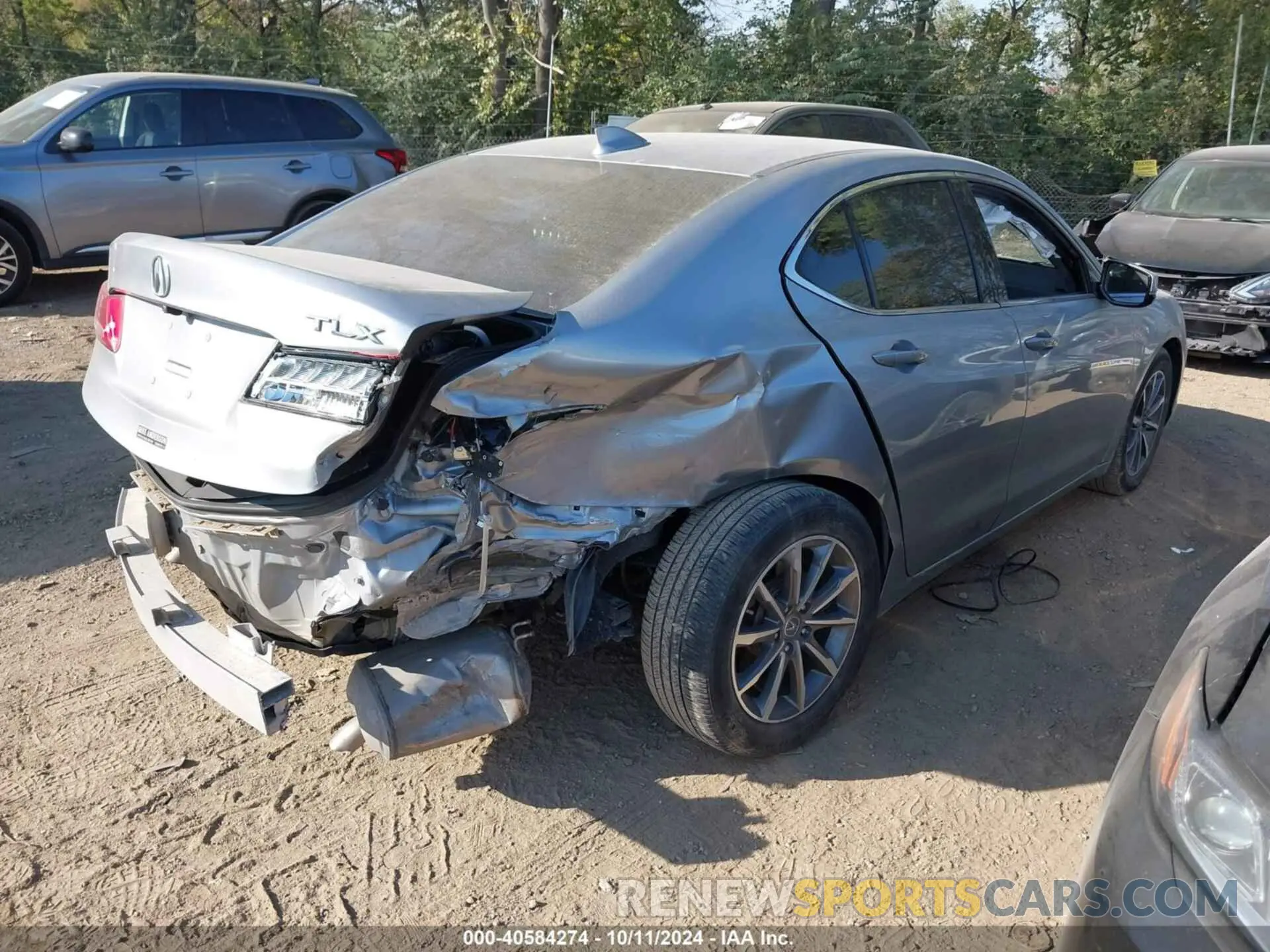 4 Photograph of a damaged car 19UUB1F3XKA009385 ACURA TLX 2019