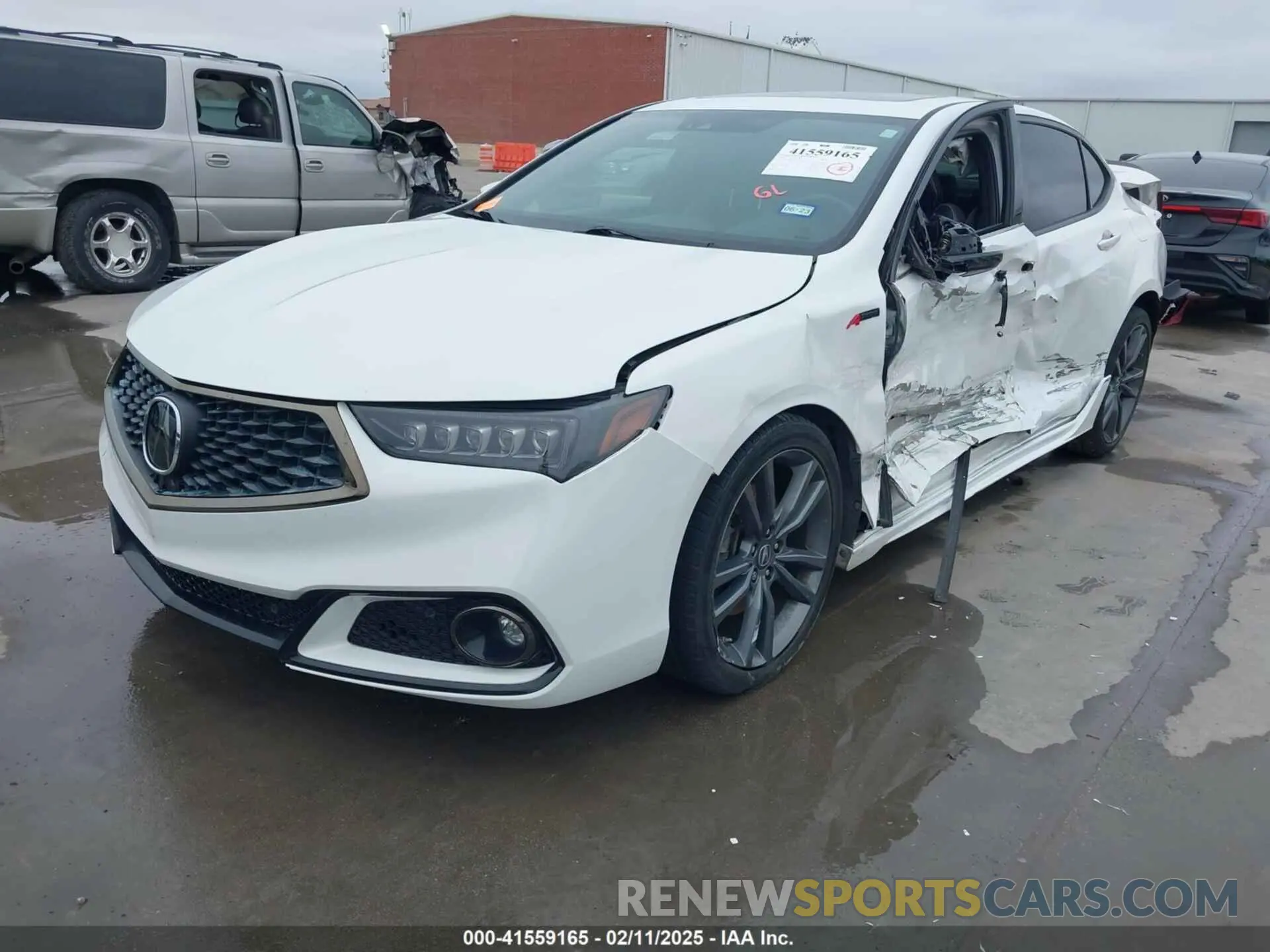 2 Photograph of a damaged car 19UUB1F60KA005081 ACURA TLX 2019