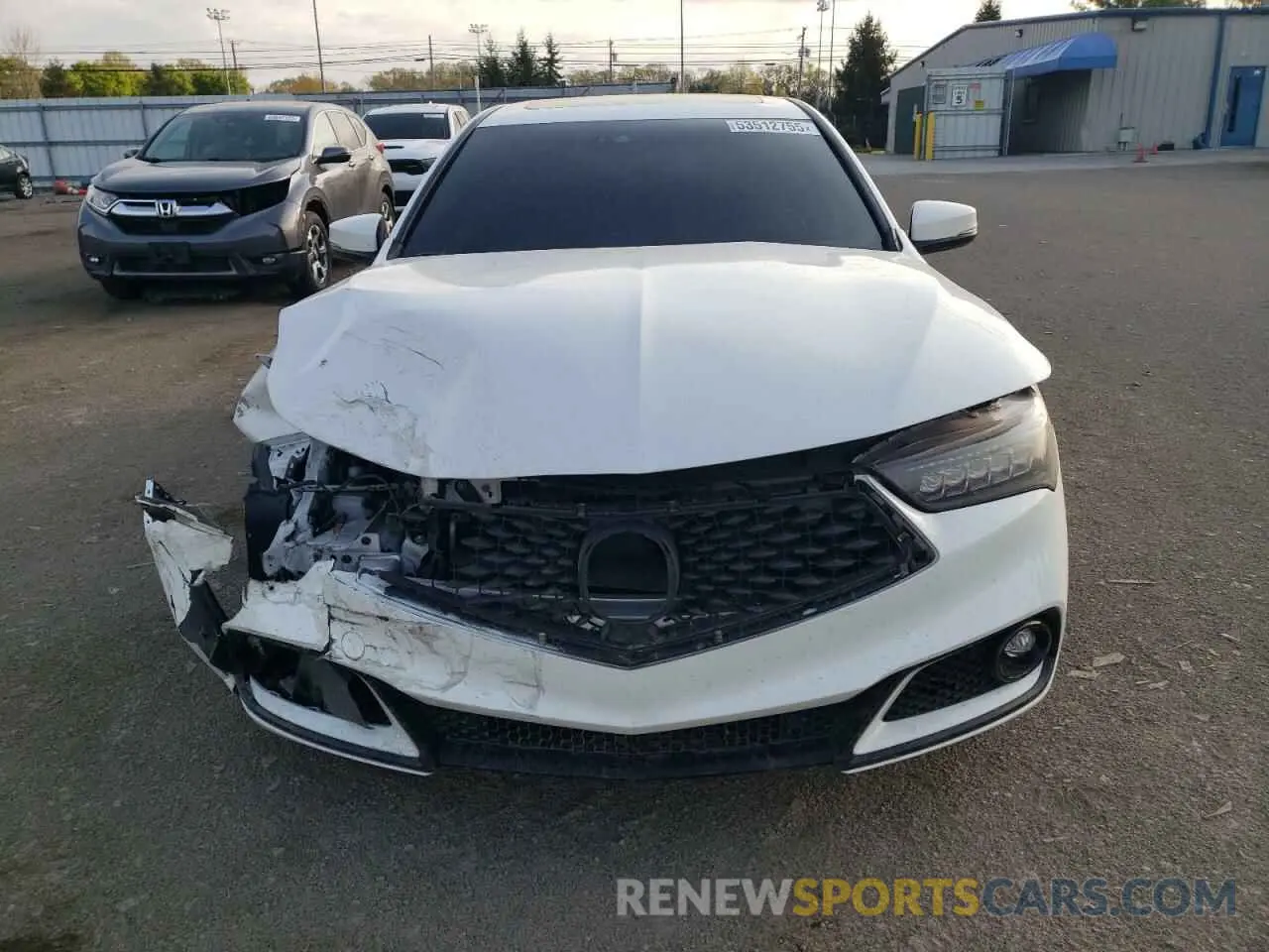 5 Photograph of a damaged car 19UUB1F63KA001901 ACURA TLX 2019