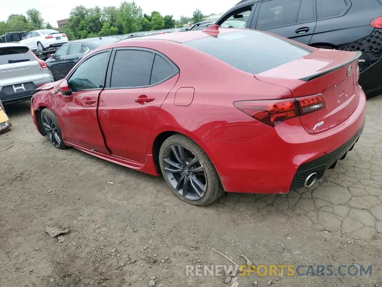 2 Photograph of a damaged car 19UUB1F63KA002093 ACURA TLX 2019