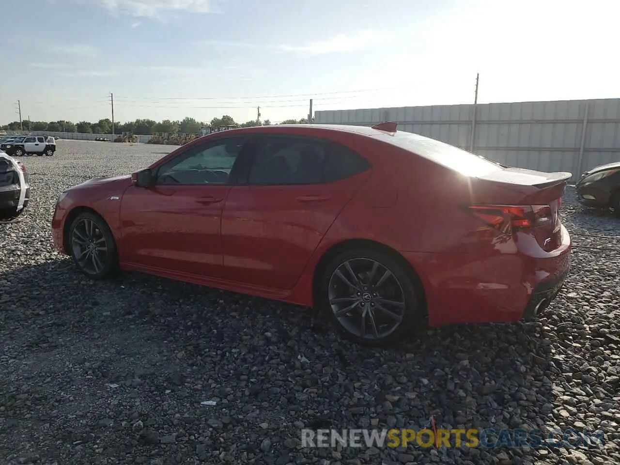 2 Photograph of a damaged car 19UUB1F63KA002899 ACURA TLX 2019