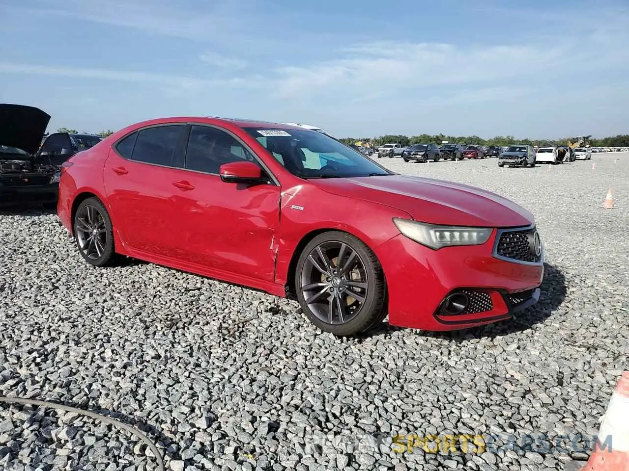 4 Photograph of a damaged car 19UUB1F63KA002899 ACURA TLX 2019