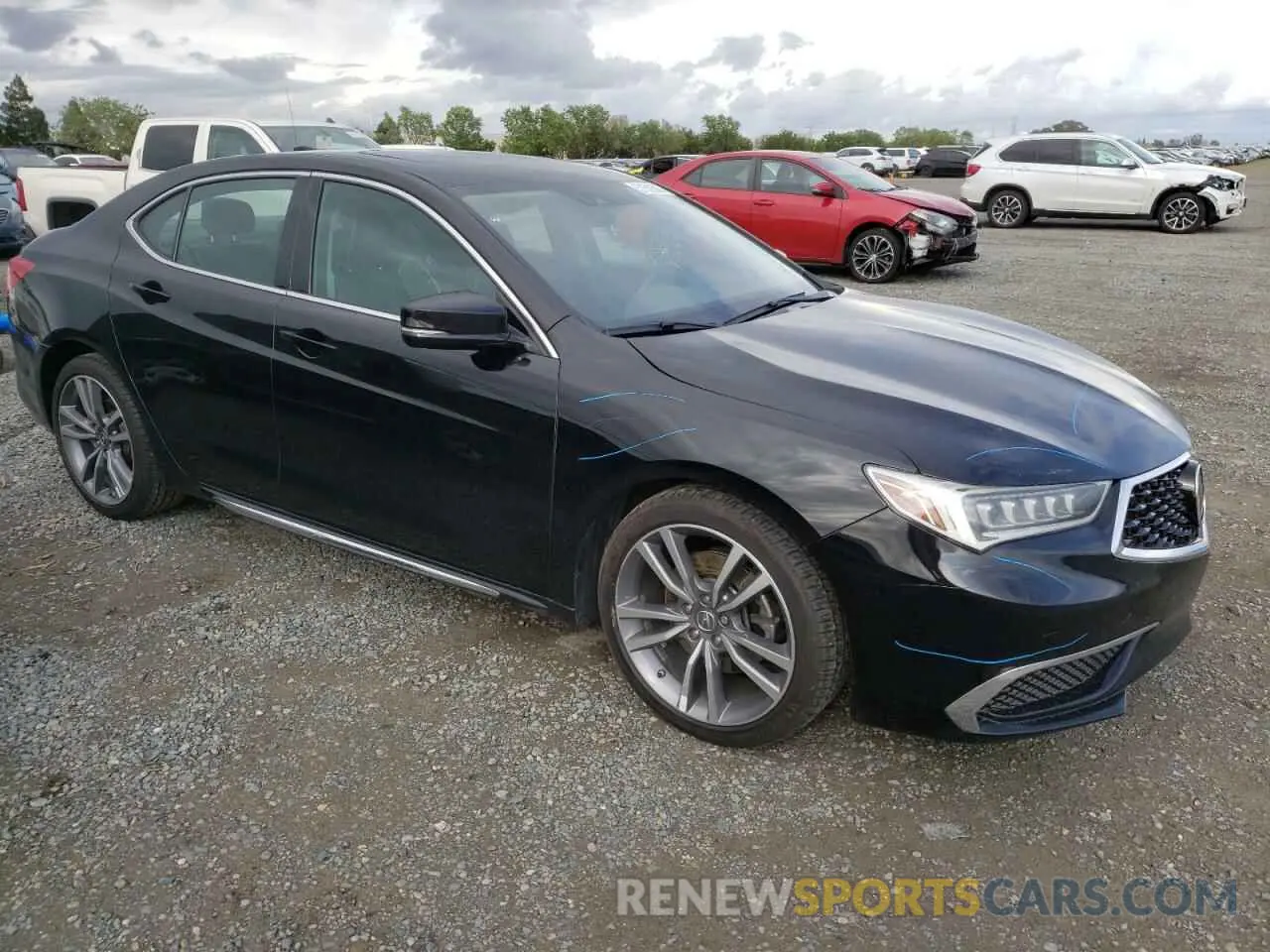 4 Photograph of a damaged car 19UUB2F43KA010456 ACURA TLX 2019