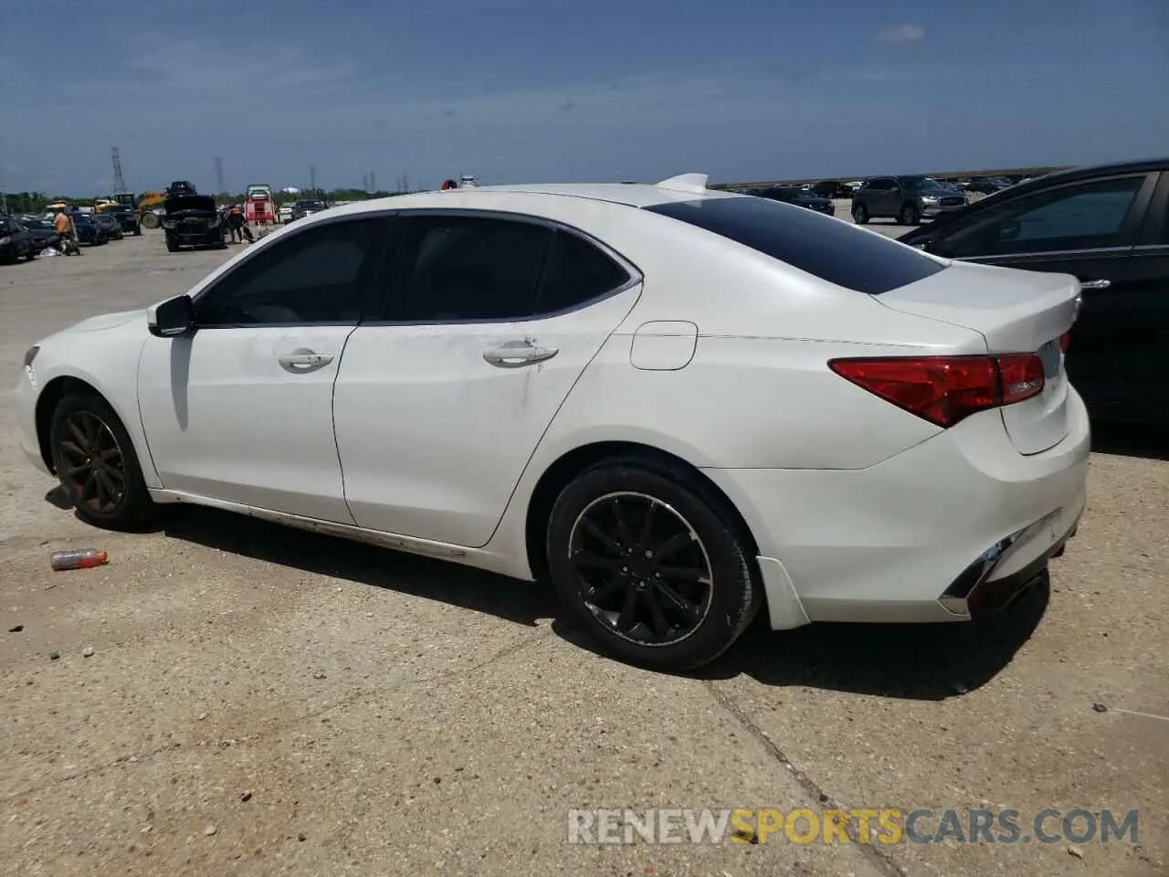 2 Photograph of a damaged car 19UUB2F44KA001958 ACURA TLX 2019