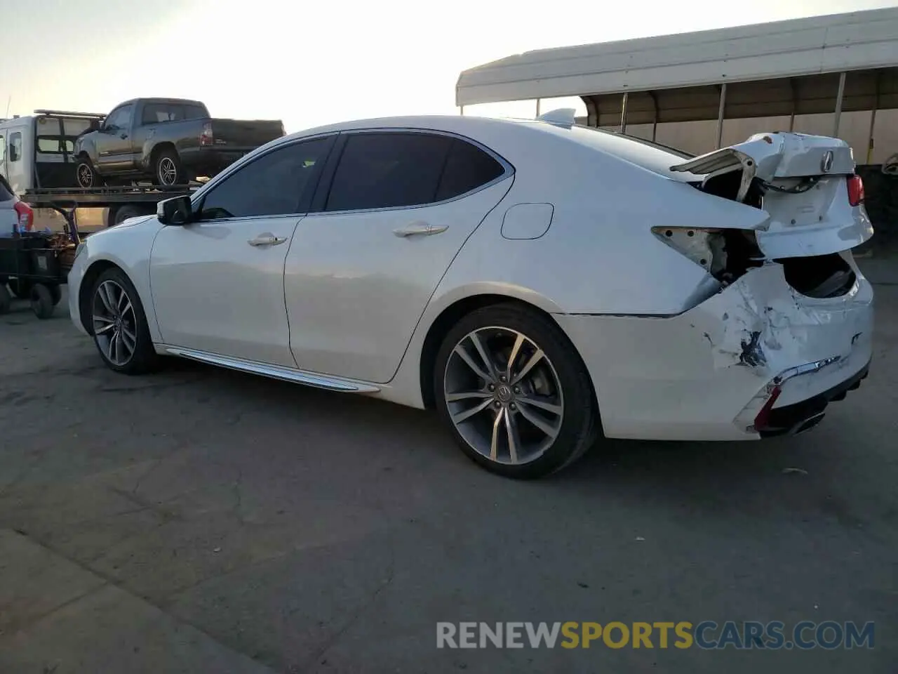 2 Photograph of a damaged car 19UUB2F48KA007732 ACURA TLX 2019