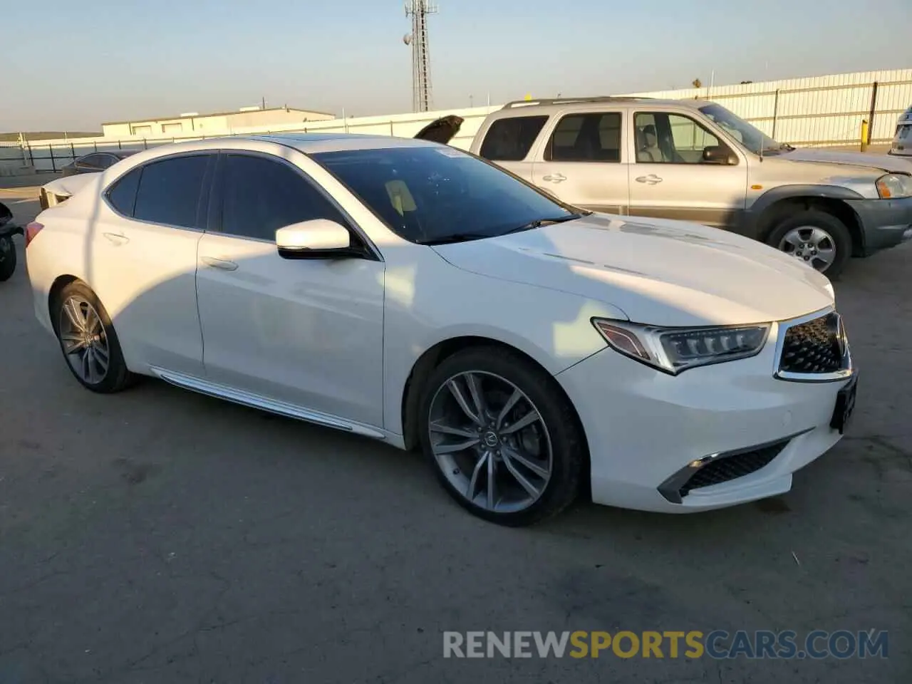4 Photograph of a damaged car 19UUB2F48KA007732 ACURA TLX 2019