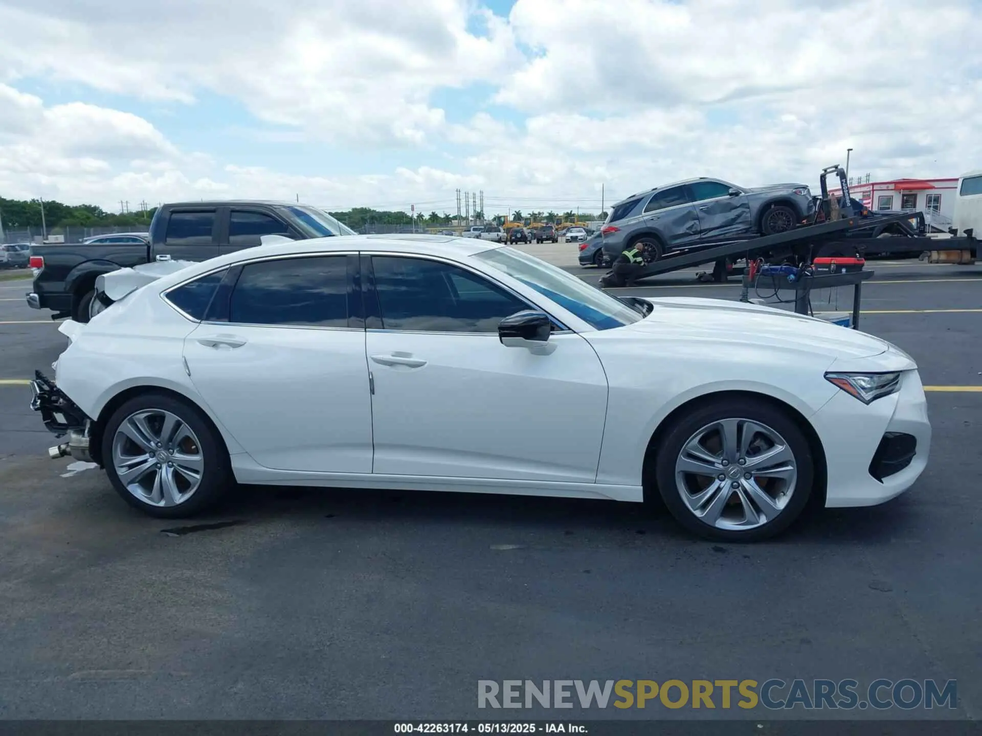14 Photograph of a damaged car 19UUB5F44NA004283 ACURA TLX 2022