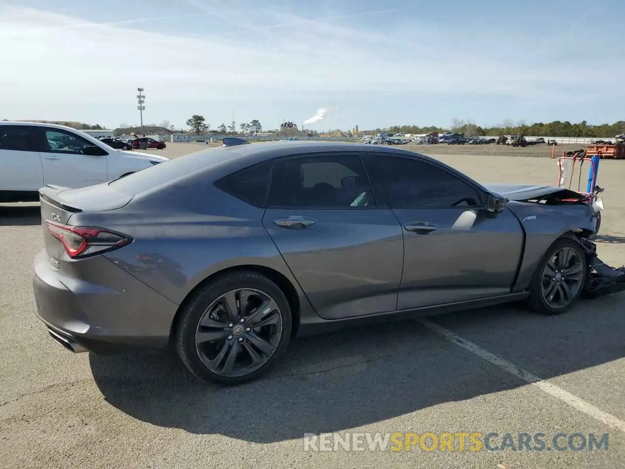 3 Photograph of a damaged car 19UUB6F57NA002610 ACURA TLX 2022