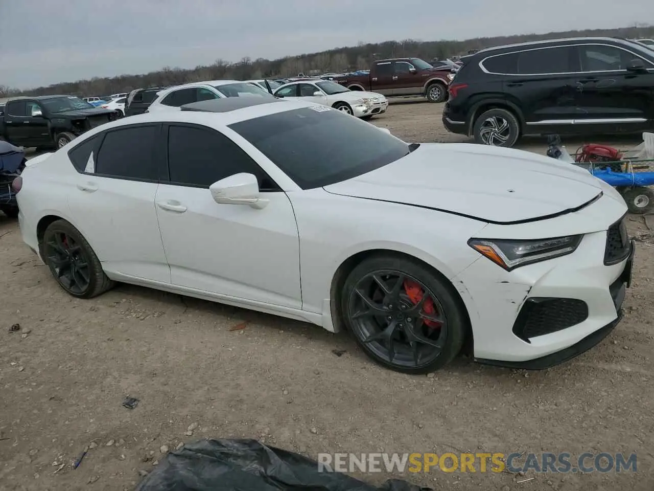 4 Photograph of a damaged car 19UUB7F92NA002300 ACURA TLX 2022