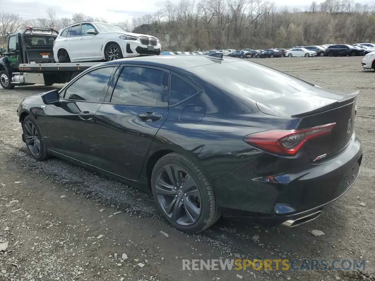 2 Photograph of a damaged car 19UUB6F50PA002337 ACURA TLX 2023