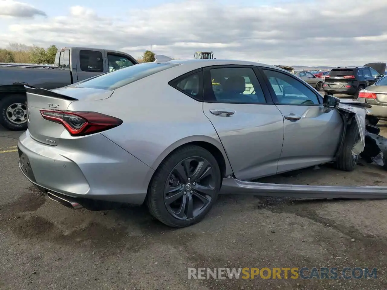 3 Photograph of a damaged car 19UUB6F50PA002869 ACURA TLX 2023