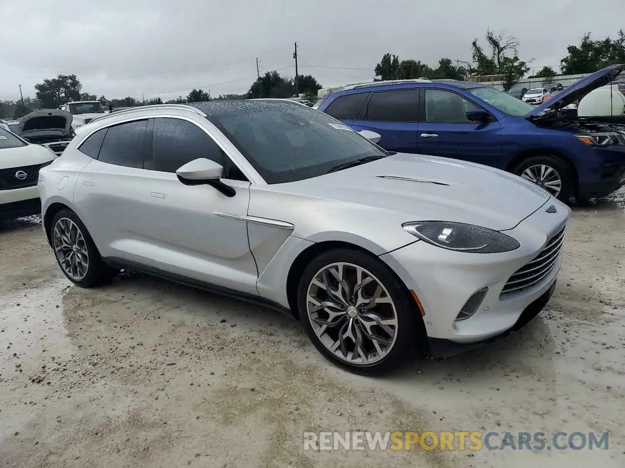 4 Photograph of a damaged car SCFVUJAW4MTV03930 ASTON MARTIN DBX 2021