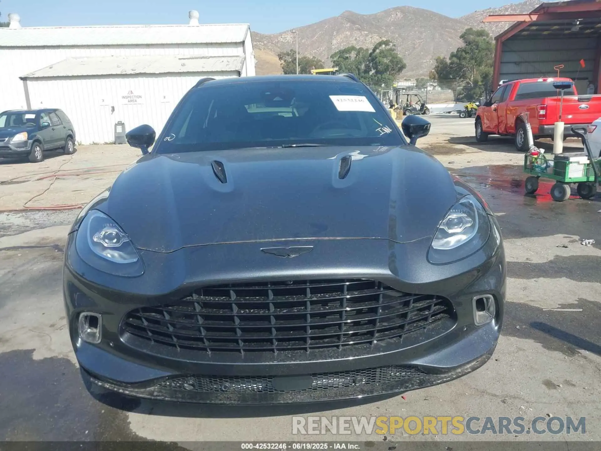 12 Photograph of a damaged car SCFVUJAW7MTV01430 ASTON MARTIN DBX 2021