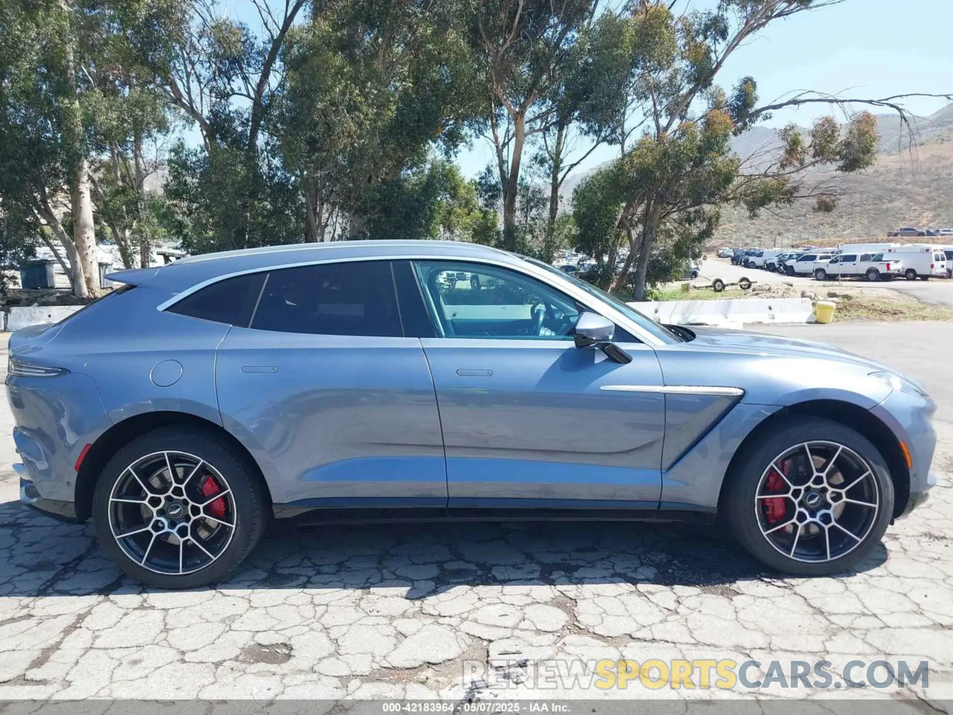 13 Photograph of a damaged car SCFVUJAW8MTV02568 ASTON MARTIN DBX 2021