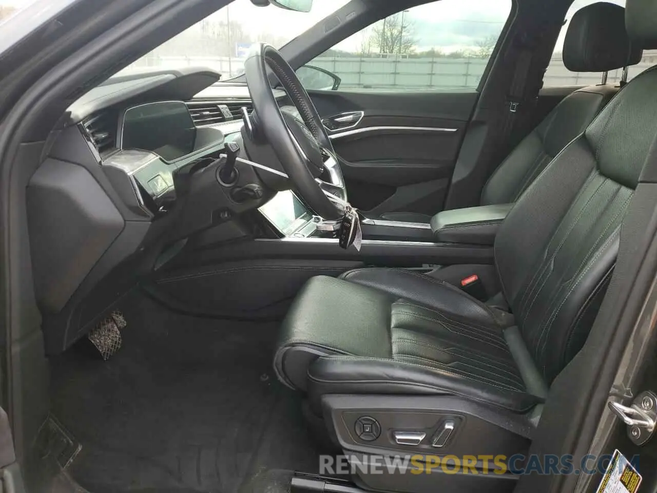 7 Photograph of a damaged car WA1VAAGE1KB005834 AUDI E-TRON 2019