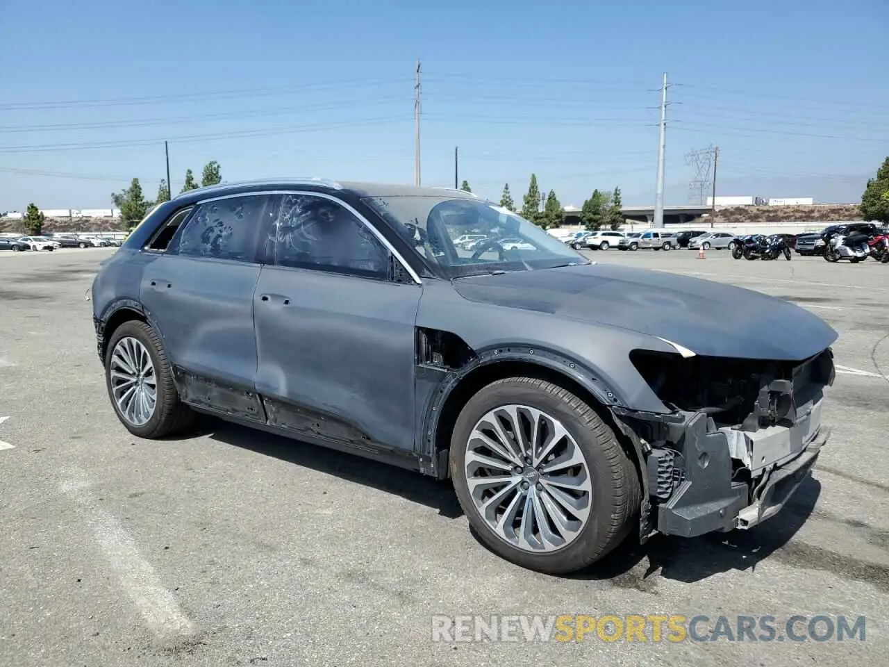 4 Photograph of a damaged car WA1VAAGE8KB022453 AUDI E-TRON 2019