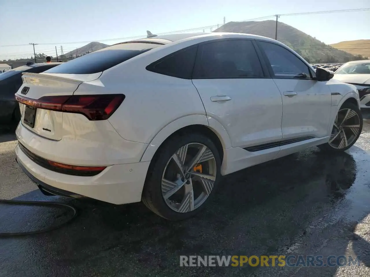 3 Photograph of a damaged car WA13AAGE2NB044248 AUDI E-TRON 2022