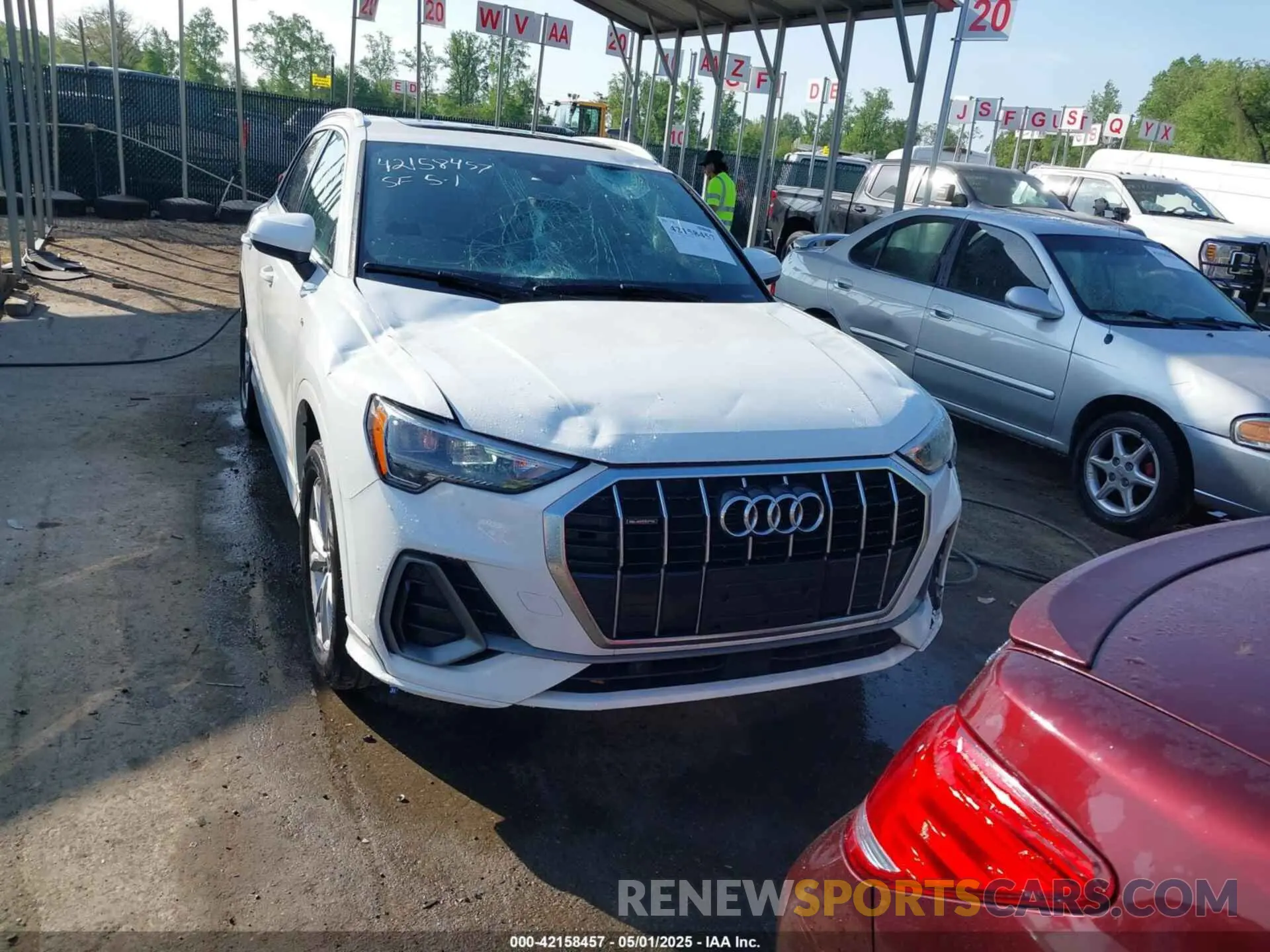 13 Photograph of a damaged car WA1DECF31M1037901 AUDI Q3 2021