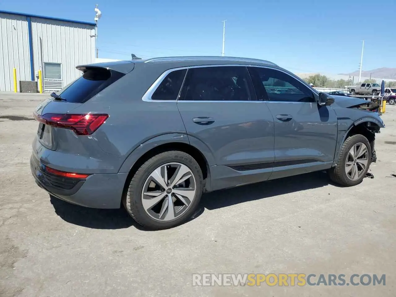 3 Photograph of a damaged car WA15AAGE0RB057434 AUDI Q8 E-TRON 2024