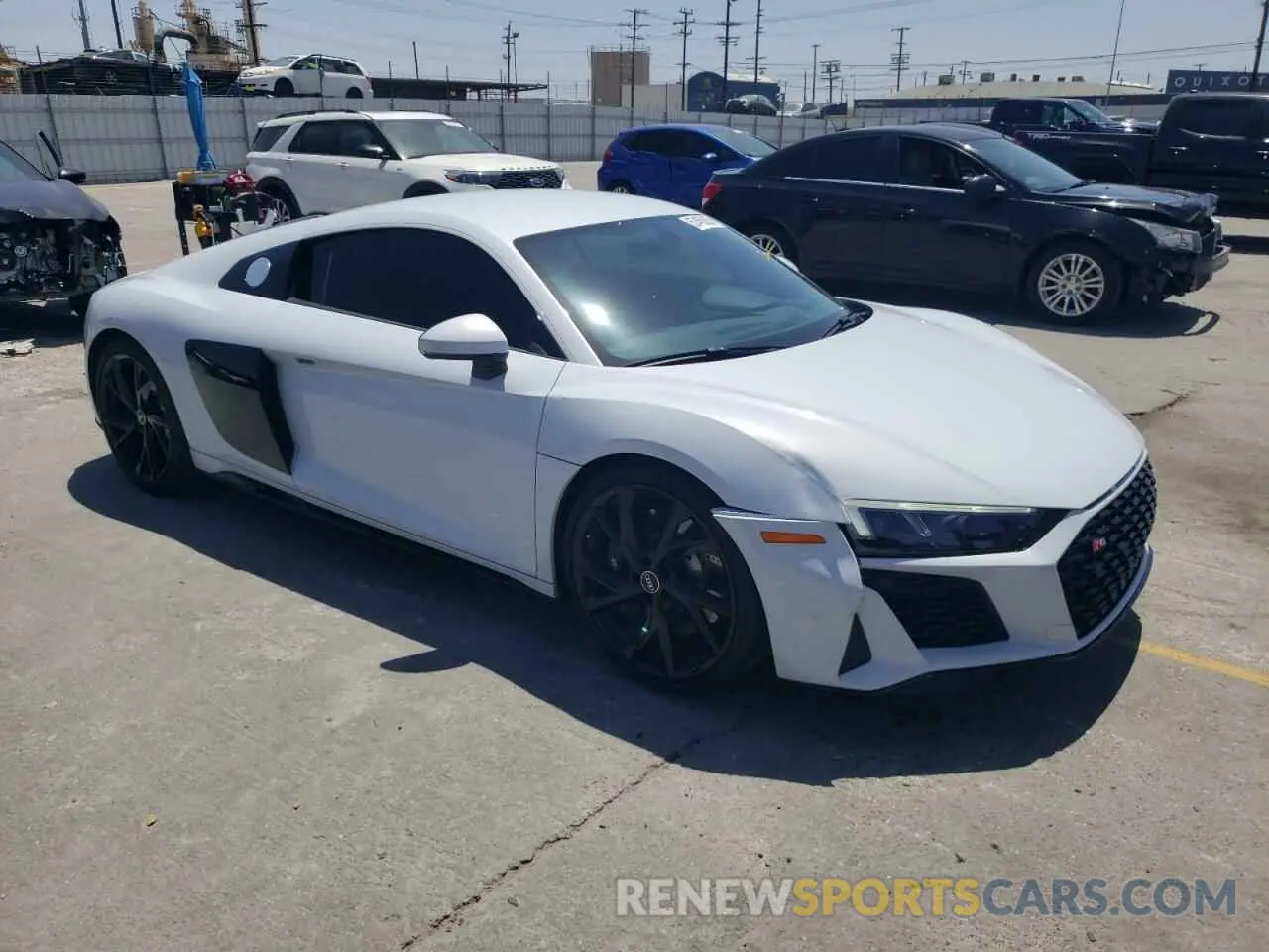 4 Photograph of a damaged car WUACEAFX9P7900103 AUDI R8 2023