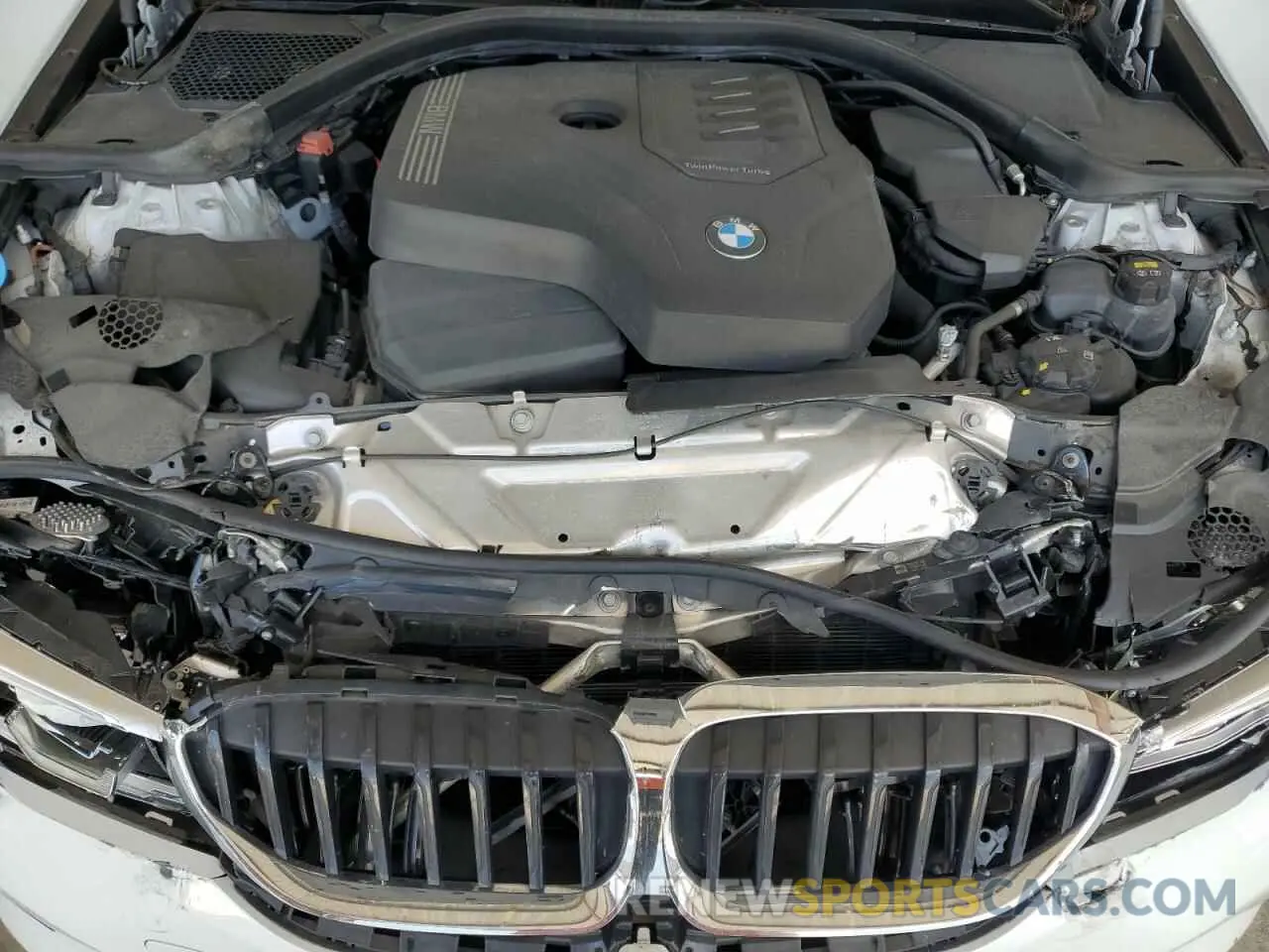 11 Photograph of a damaged car WBA5R1C59KAK12690 BMW 3 SERIES 2019