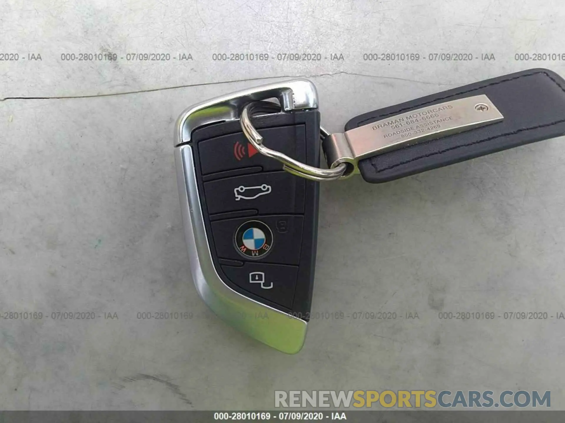 11 Photograph of a damaged car WBA5R1C5XKAK08633 BMW 3 SERIES 2019