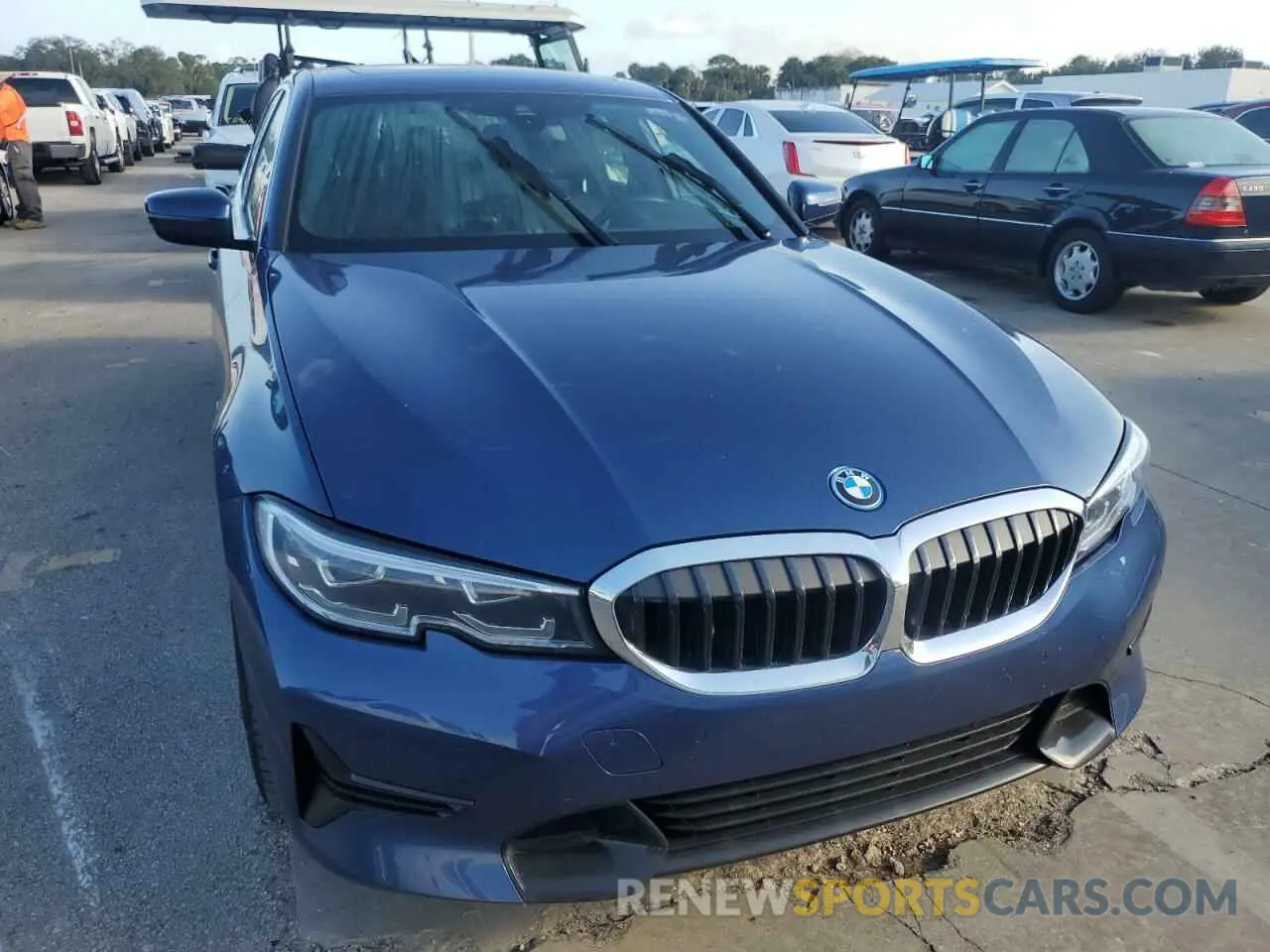 5 Photograph of a damaged car 3MW5P7J01N8C52651 BMW 3 SERIES 2022