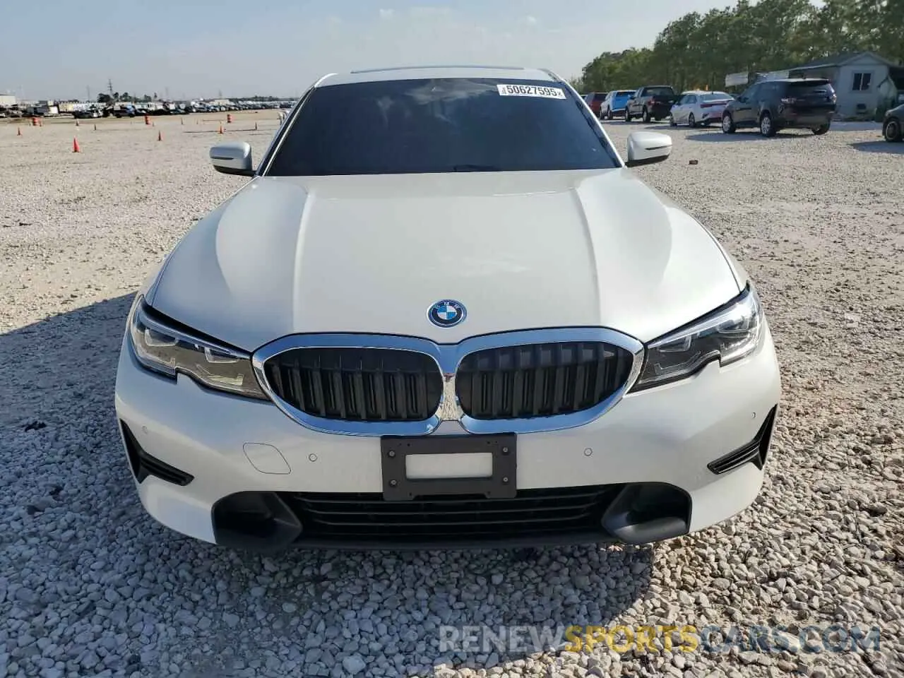 5 Photograph of a damaged car 3MW5P7J03N8C66082 BMW 3 SERIES 2022